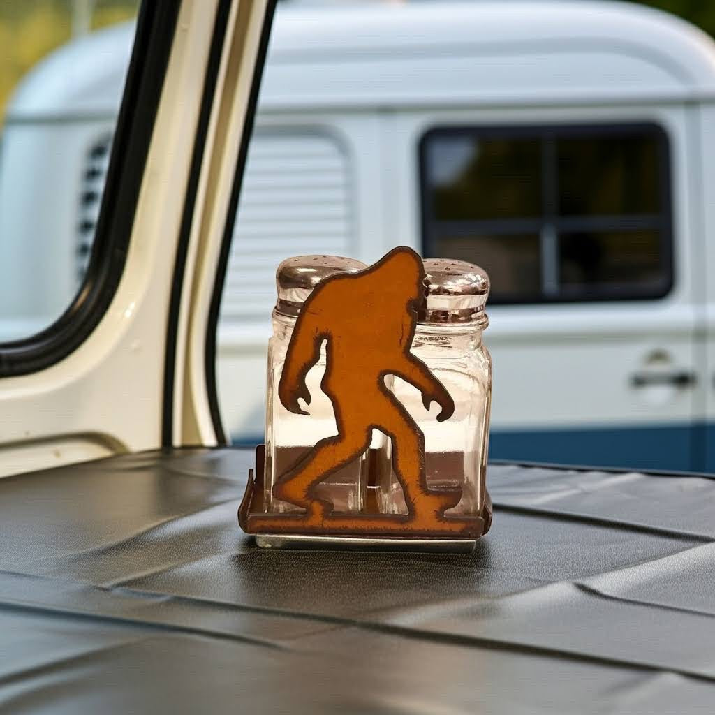 Forager Provisions LTD Bigfoot salt and pepper holder made of rustic steel with two glass shakers on a table