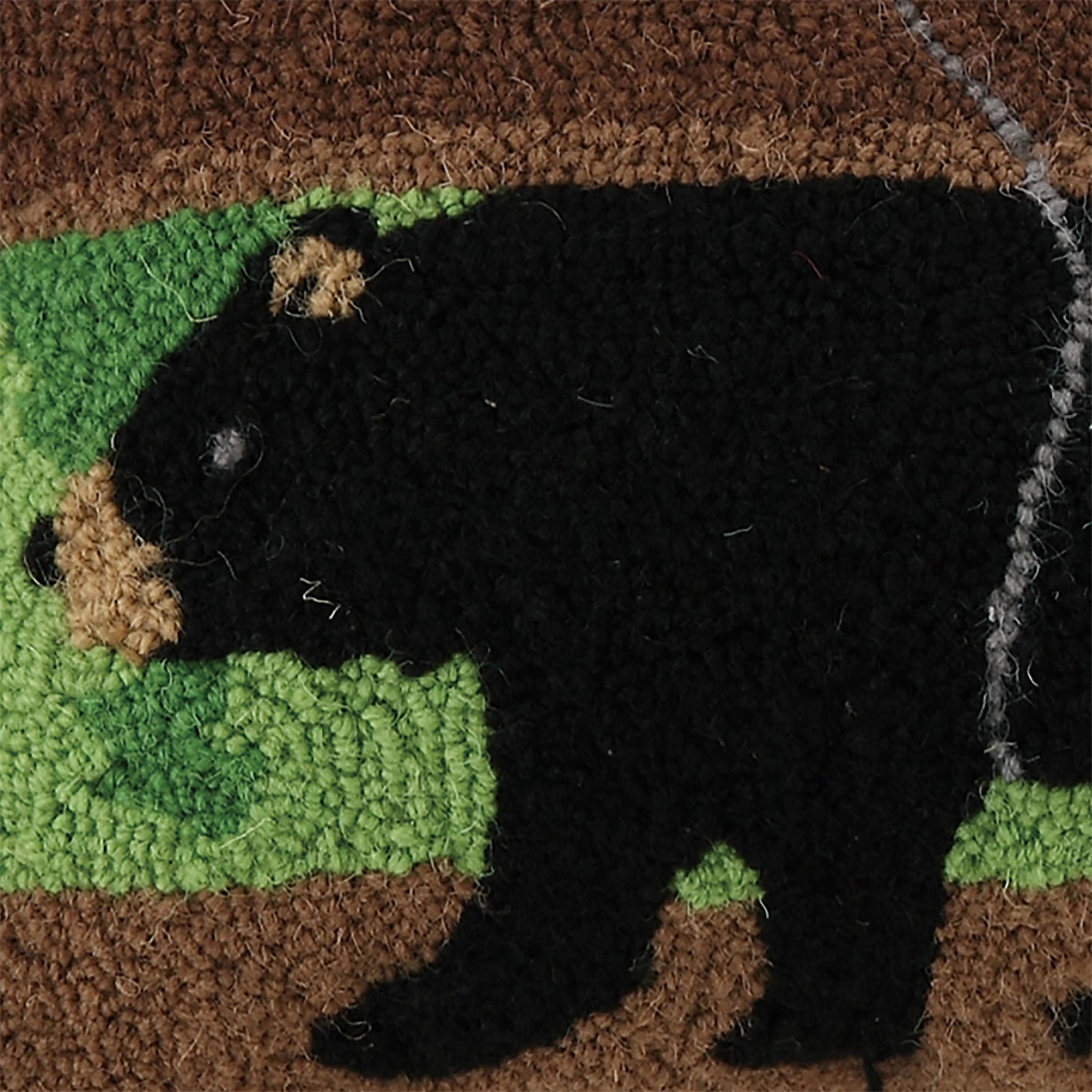 Peking Handicraft Canoe Bear cushion with black bear, rustic green & brown background; cozy woodland cabin decor pillow.