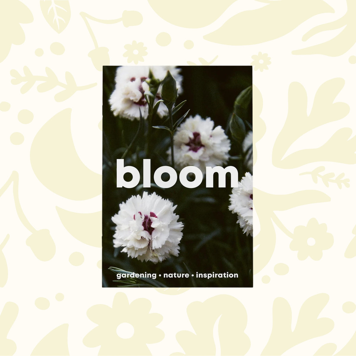 Book  featuring white flowers and the word "bloom" in bold. Text at the bottom reads "gardening • nature • inspiration." Perfect for your Bloom Zine Issue 14 Spring/Summer 2023 collection.