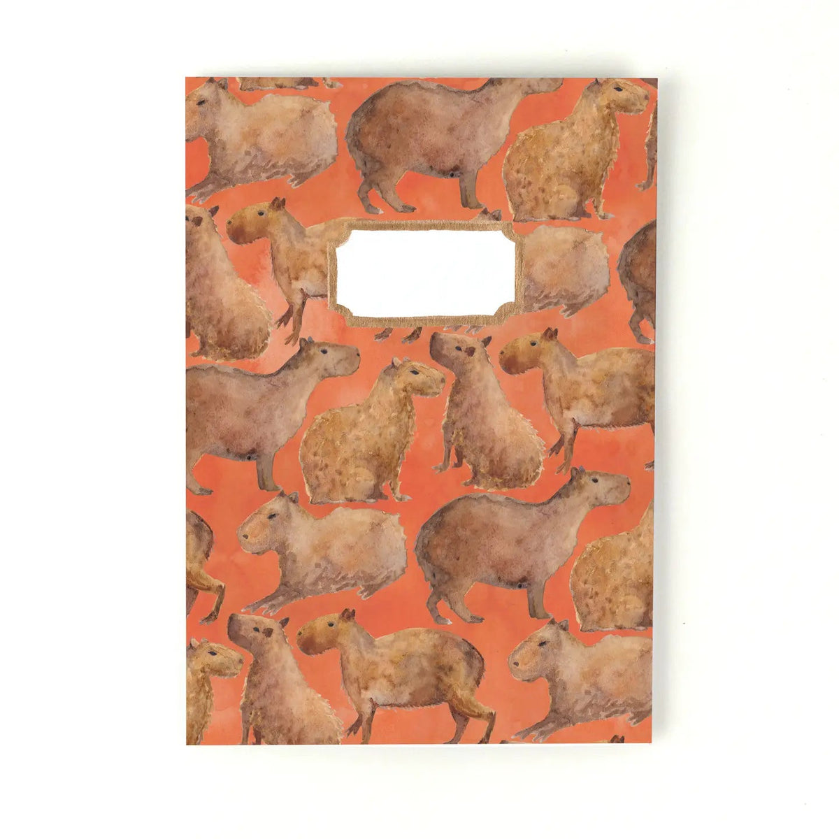 Forager Provisions LTD Bison Bindery A5 recycled notepad featuring an orange cover with a capybara pattern