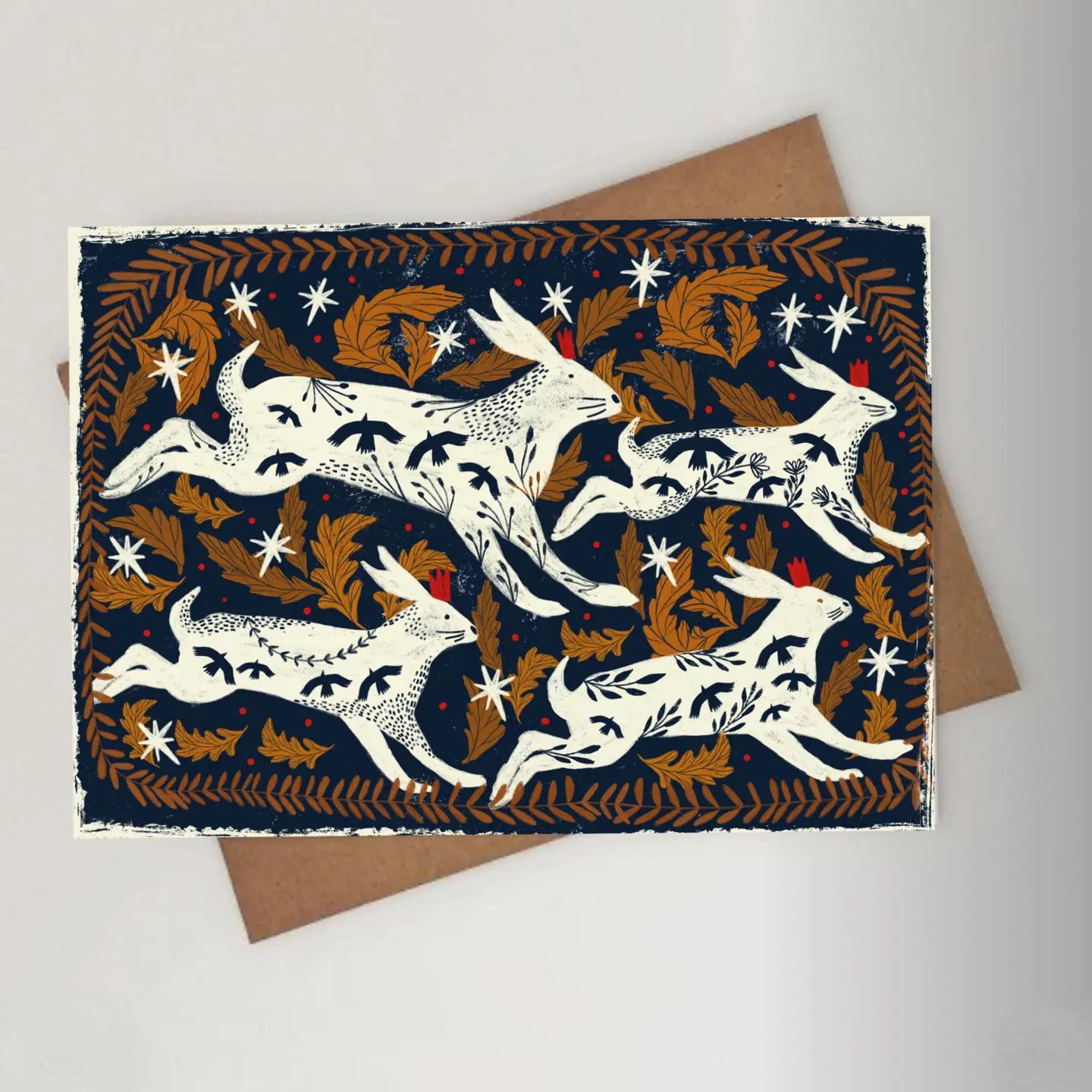 Carole Hillman French Folk Hares greeting card, dark blue with brown leaves, stars; includes matching brown envelope. Perfect gift.