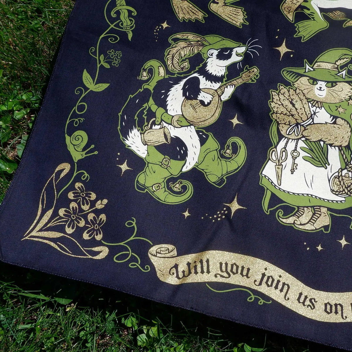 Forager Provisions LTD Cat Coven cotton bandana featuring whimsical fantasy animal artwork in green and gold on black.