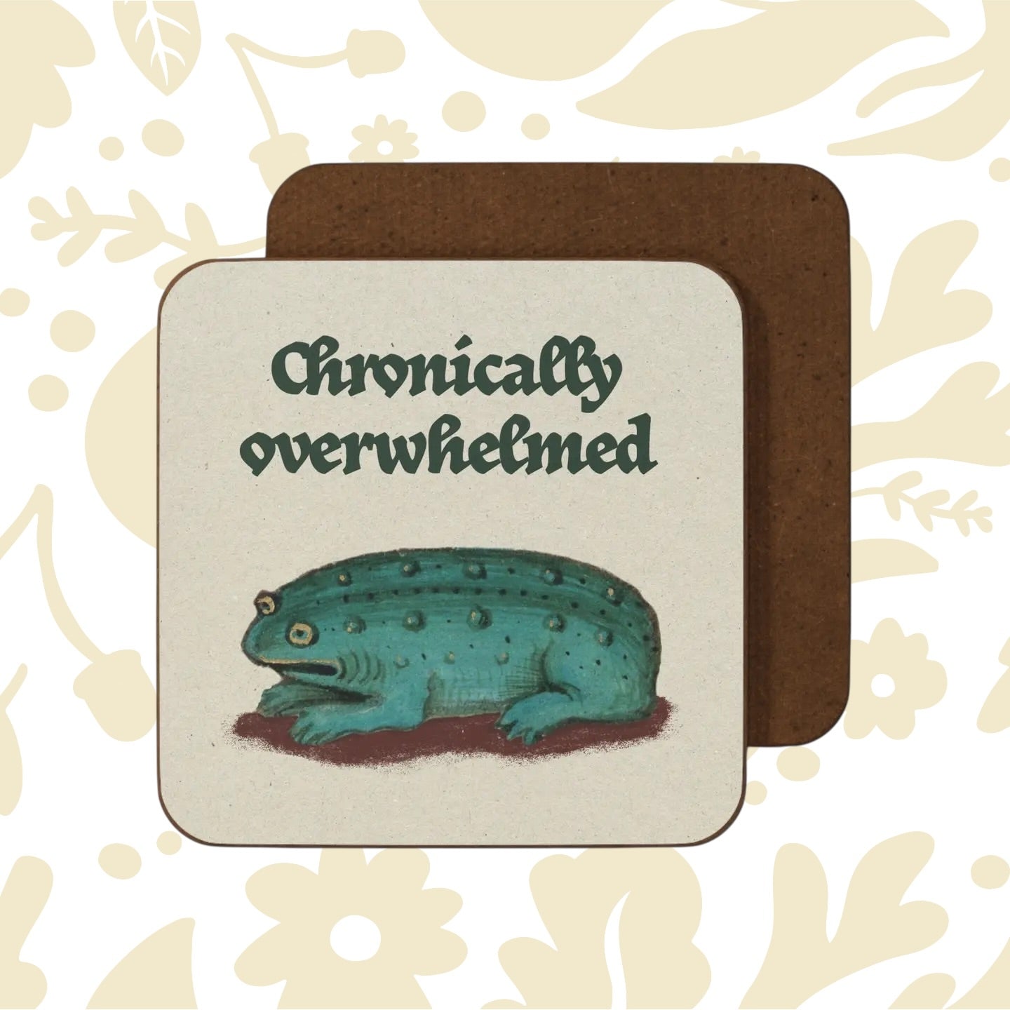 Blue spotted frog under “Chronically overwhelmed” text on Betiobca Medieval Overwhelmed Frog Coaster, unique gift idea.