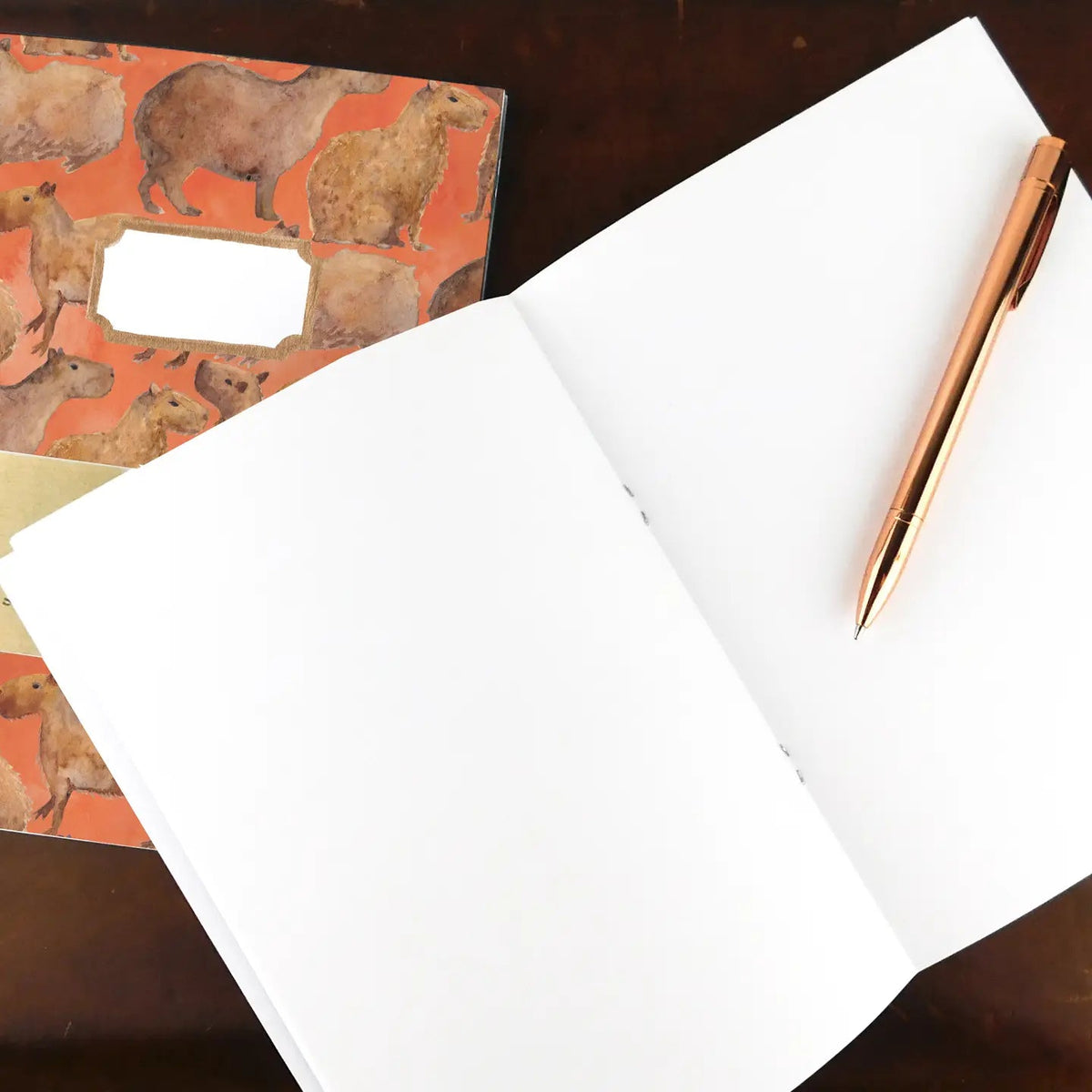 Forager Provisions LTD Bison Bindery A5 recycled notepad with capybara cover illustration and blank white pages