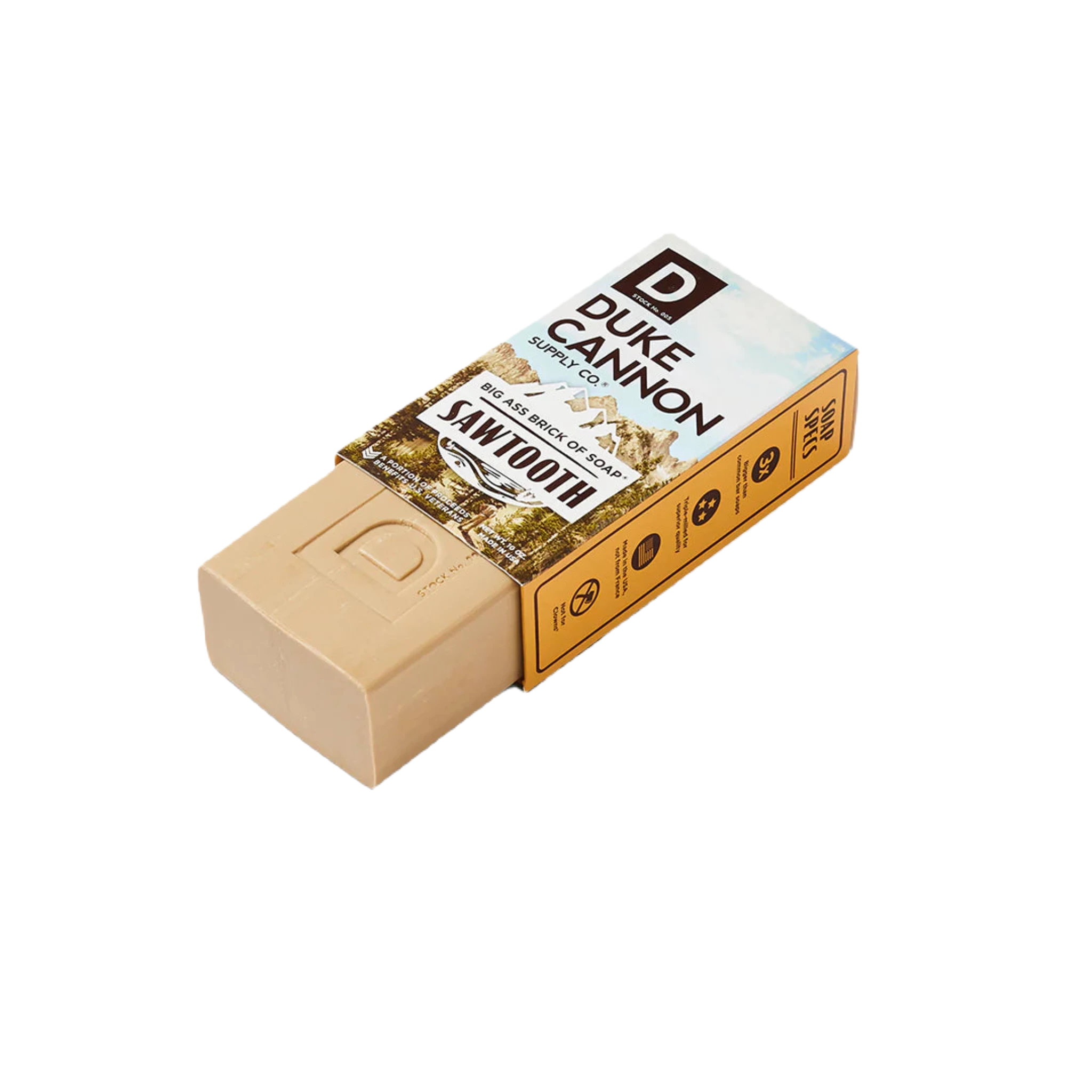 Duke Cannon Big Ass Brick Of Soap - Sawtooth, featuring RSPO Certified Palm Oil, stands next to its box displaying the brand's name and a mountain landscape.