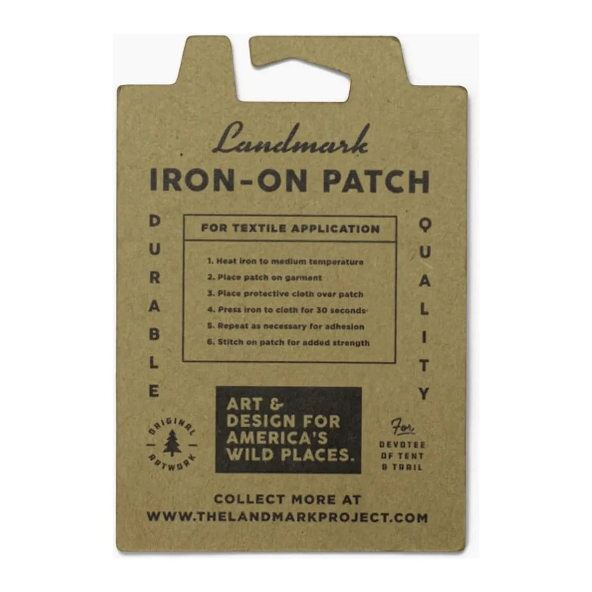 Cardboard packaging for "The Landmark Project Smokey Bear Patch - Smokey Hat" includes application steps and website info for "The Landmark Project." Perfect for outdoor adventures, it features sustainable packaging that's both eco-friendly and stylish.