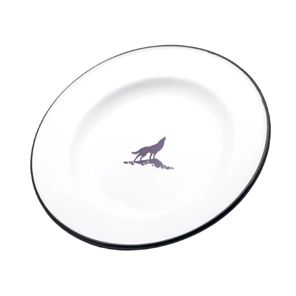 Emalco Enamelware 9.5 Wolf Plate: a white enamelware plate with a black rim and a striking purple silhouette of a howling wolf in the center, perfect for adventurers embarking on a mountain expedition.