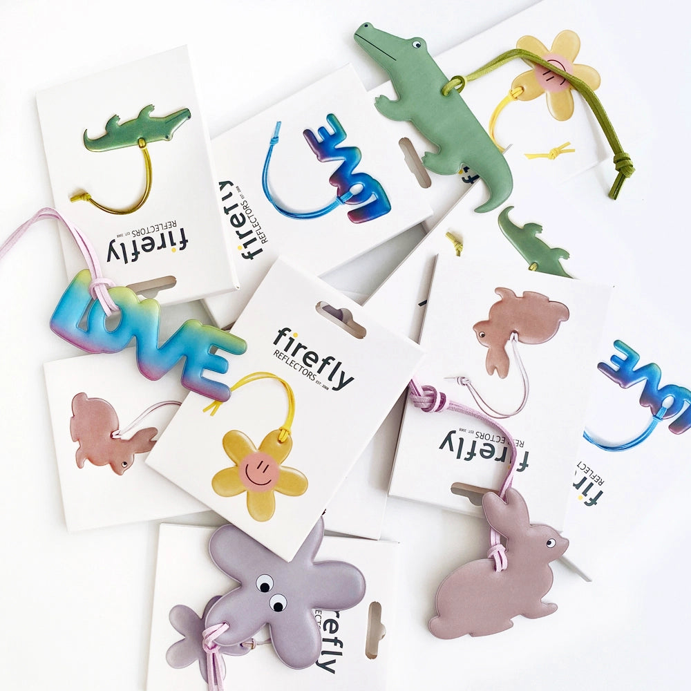 Firefly Sweden Animal Shape Reflector Bag Charm Crocodile plus pastel animal keychains on white, cute accessories for bags.