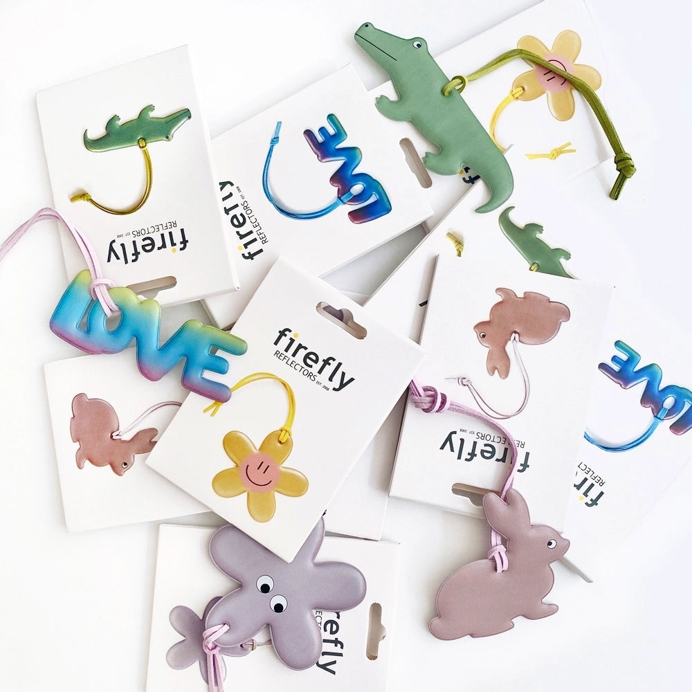 Firefly Sweden Animal Shape Reflector Bag Charm Crocodile plus pastel animal keychains on white, cute accessories for bags.