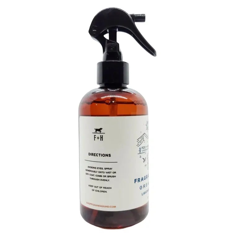 A brown bottle of Fox + Hound Dog Cologne - Yellowstone with a black sprayer and an illustration on the label, part of the Outdoor Adventures Collection.