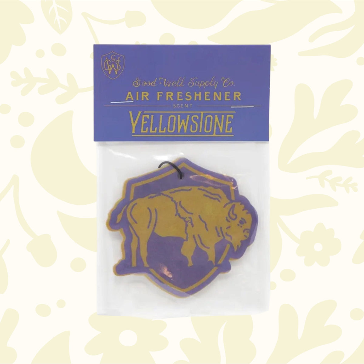 The Good & Well Supply Co Hangable Air Freshener - Yellowstone, featuring a buffalo design on a yellow and purple background, proudly supports the National Park Foundation.