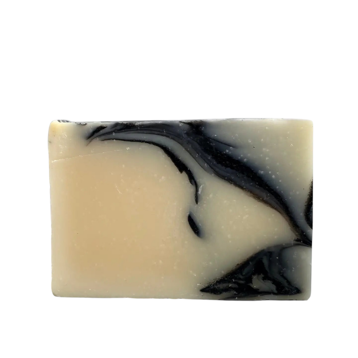 Growing Wilder The Explorers Soap has a creamy base, bold black swirls, and a sandalwood bergamot scent for luxurious skincare.