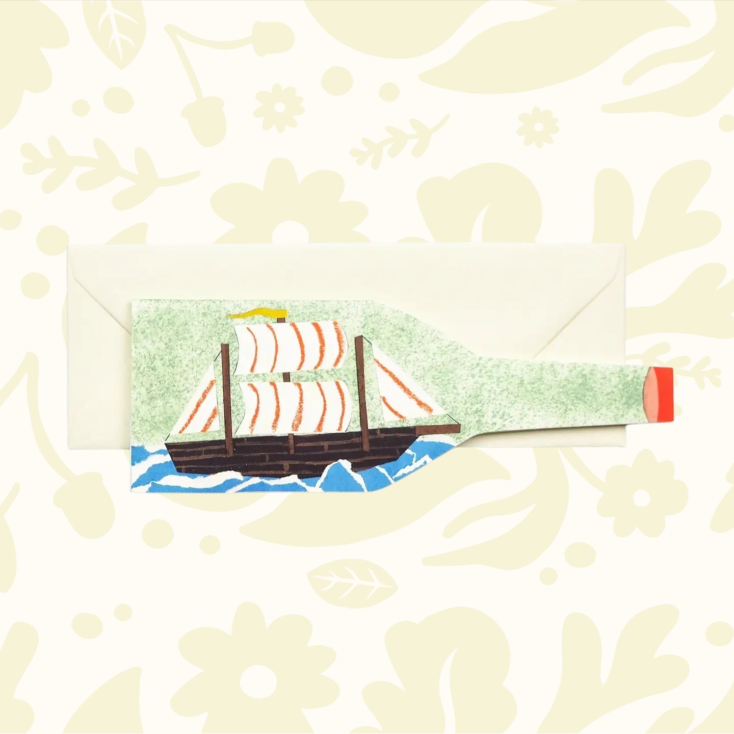 Hadley Ship in a Bottle Greeting Card displayed on cream envelope, perfect nautical stationery gift, white background for clarity.
