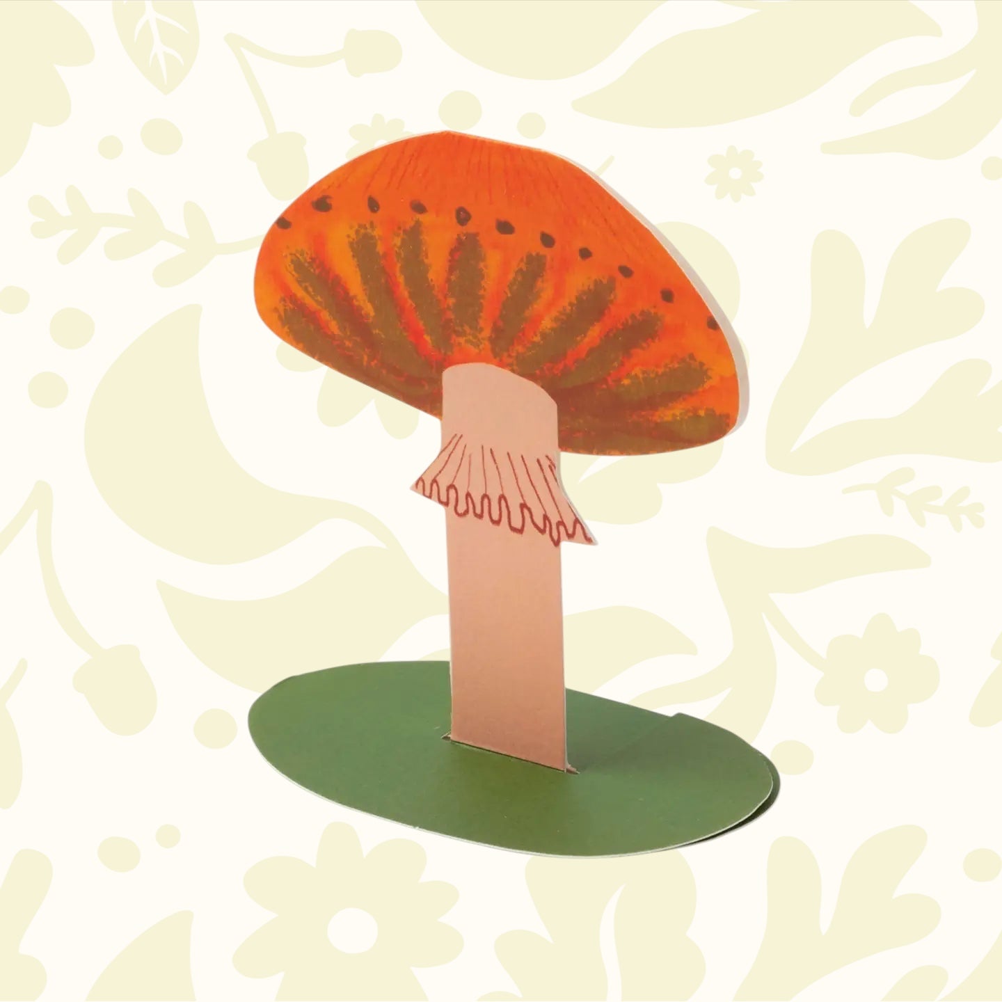 Forager Provisions LTD orange frilly mushroom stand-up greeting card with textured collage details on a floral background