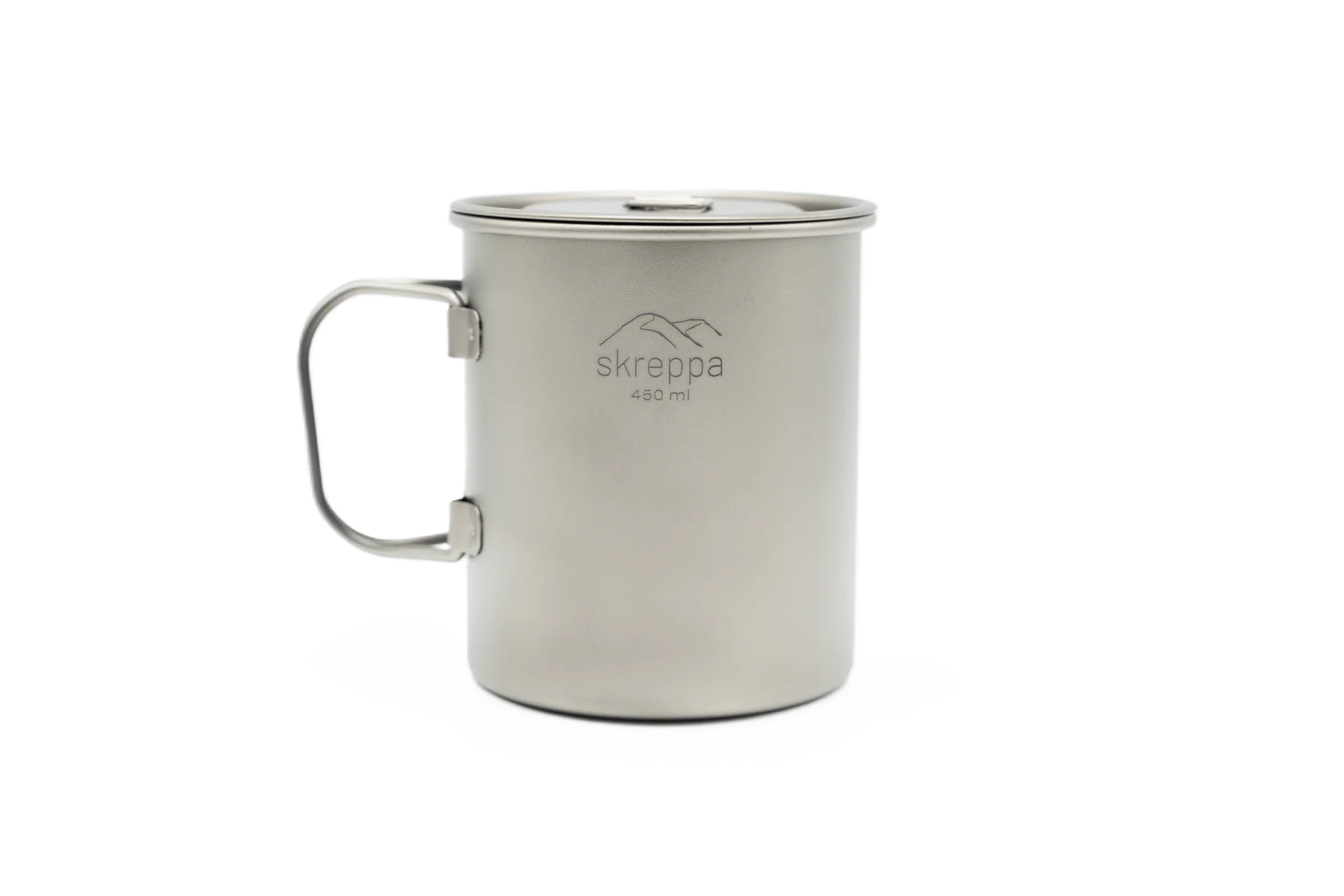 Skreppa Single Wall Titanium Mug 450ml with lid and handle for camping, lightweight travel cup, geodic design on white background.