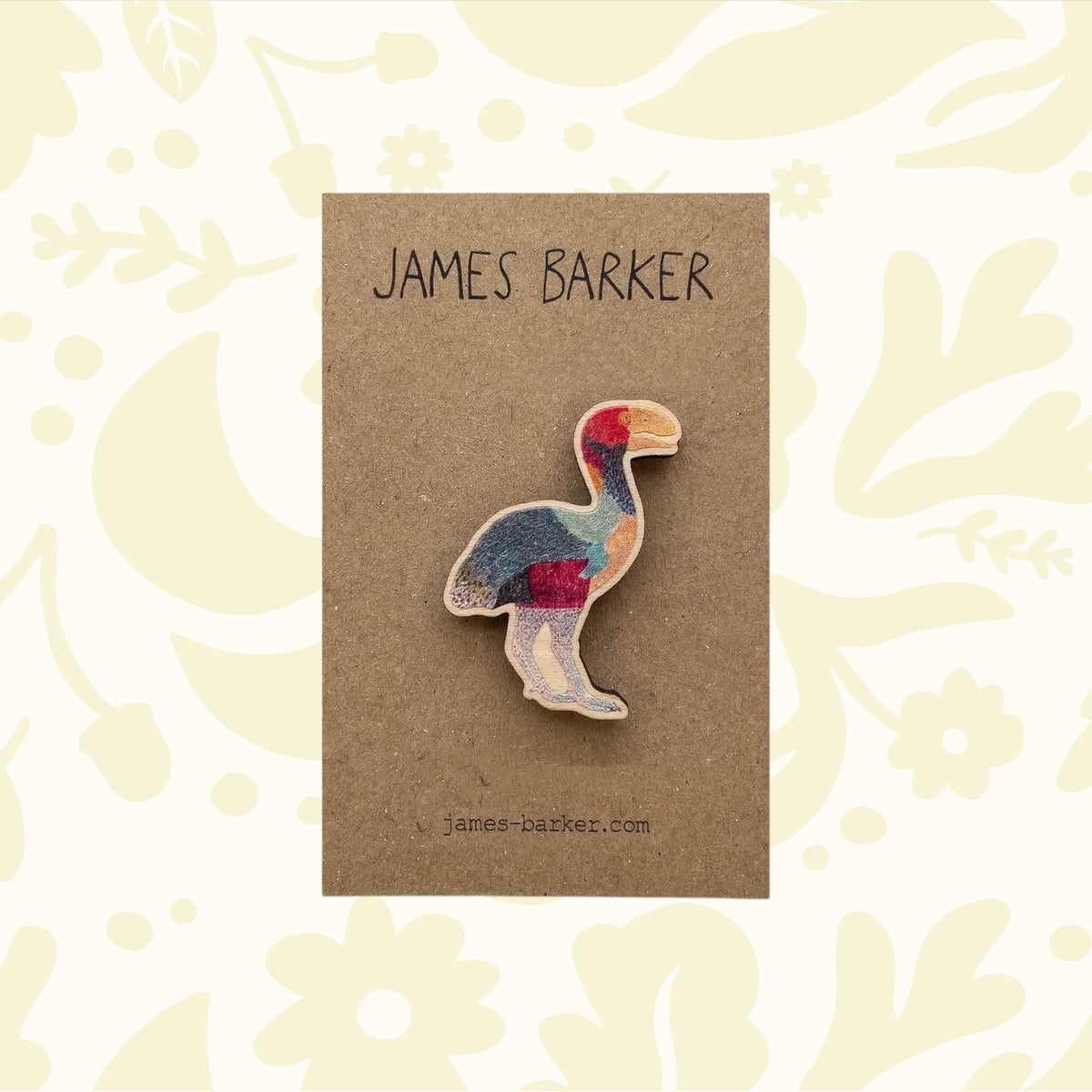 James Barker Extinct Gastornis Wooden Pin displayed on a branded brown card with James Barker website visible underneath for details.