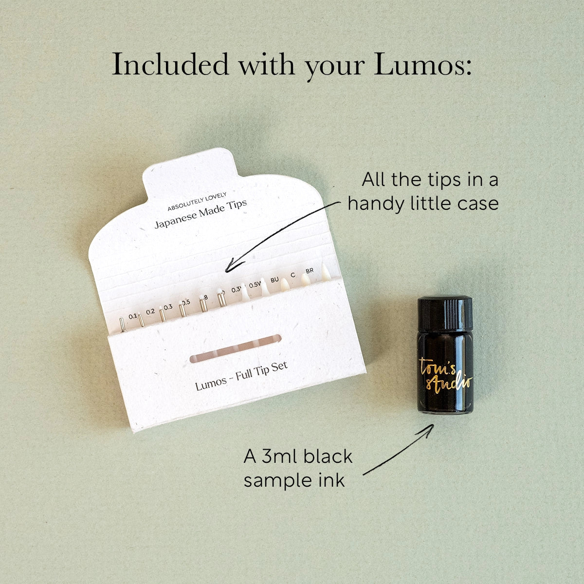 Tom’s Studio Lumos Mini Pen Matte Black, interchangeable nibs, 3ml black ink in white case on light background.