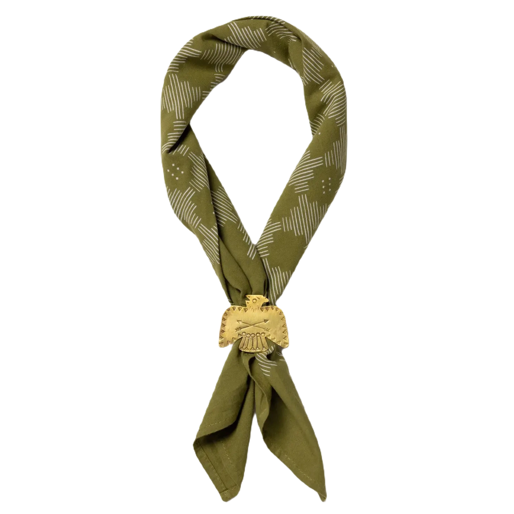 A green scarf with white geometric patterns, styled in a loop and secured by the Jenni Earle Brass Thunderbird Handmade Bandana Slide, brings a touch of western style.
