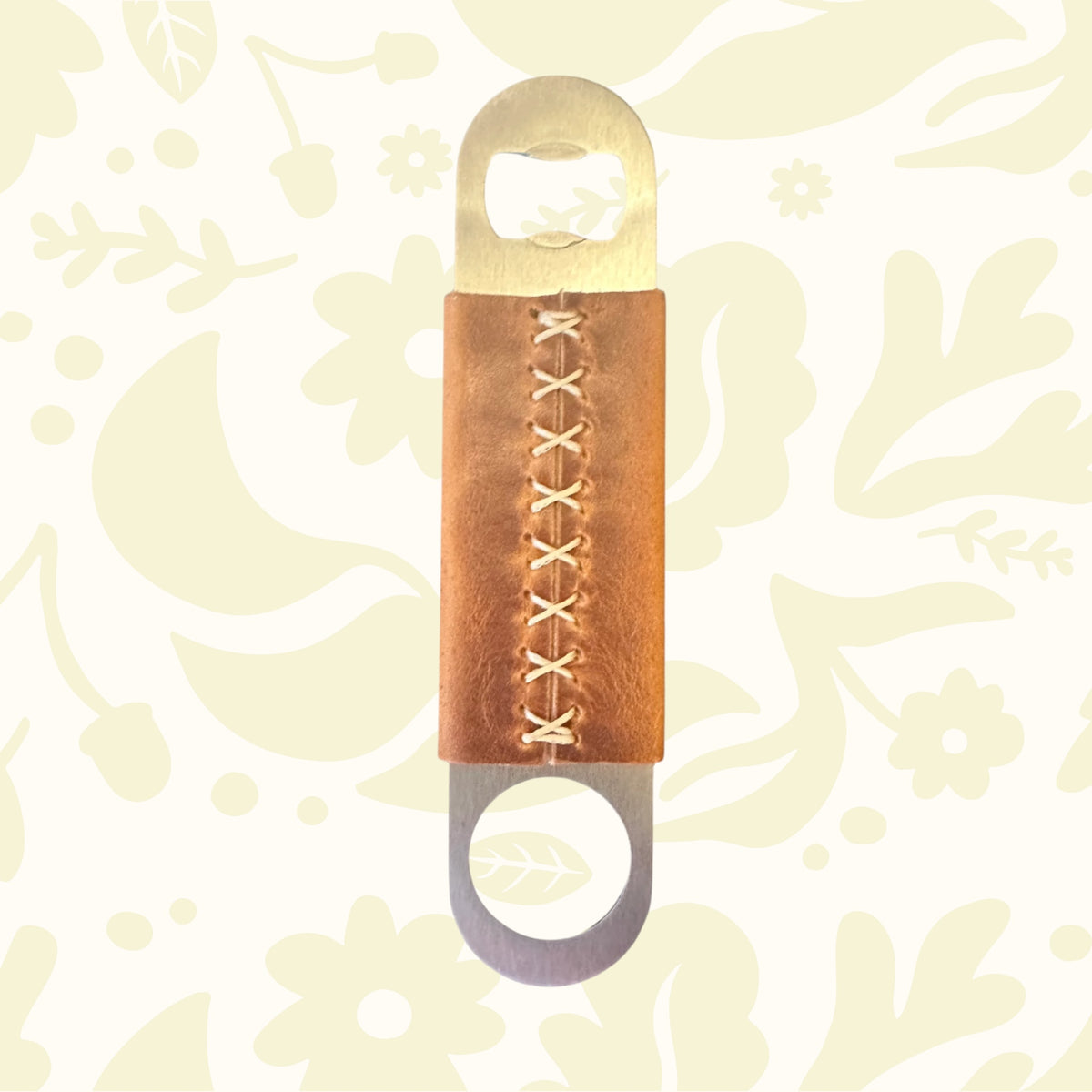 Kjøtt Supply Co bar blade bottle opener with Horween leather grip, premium leather bar tool on white background.