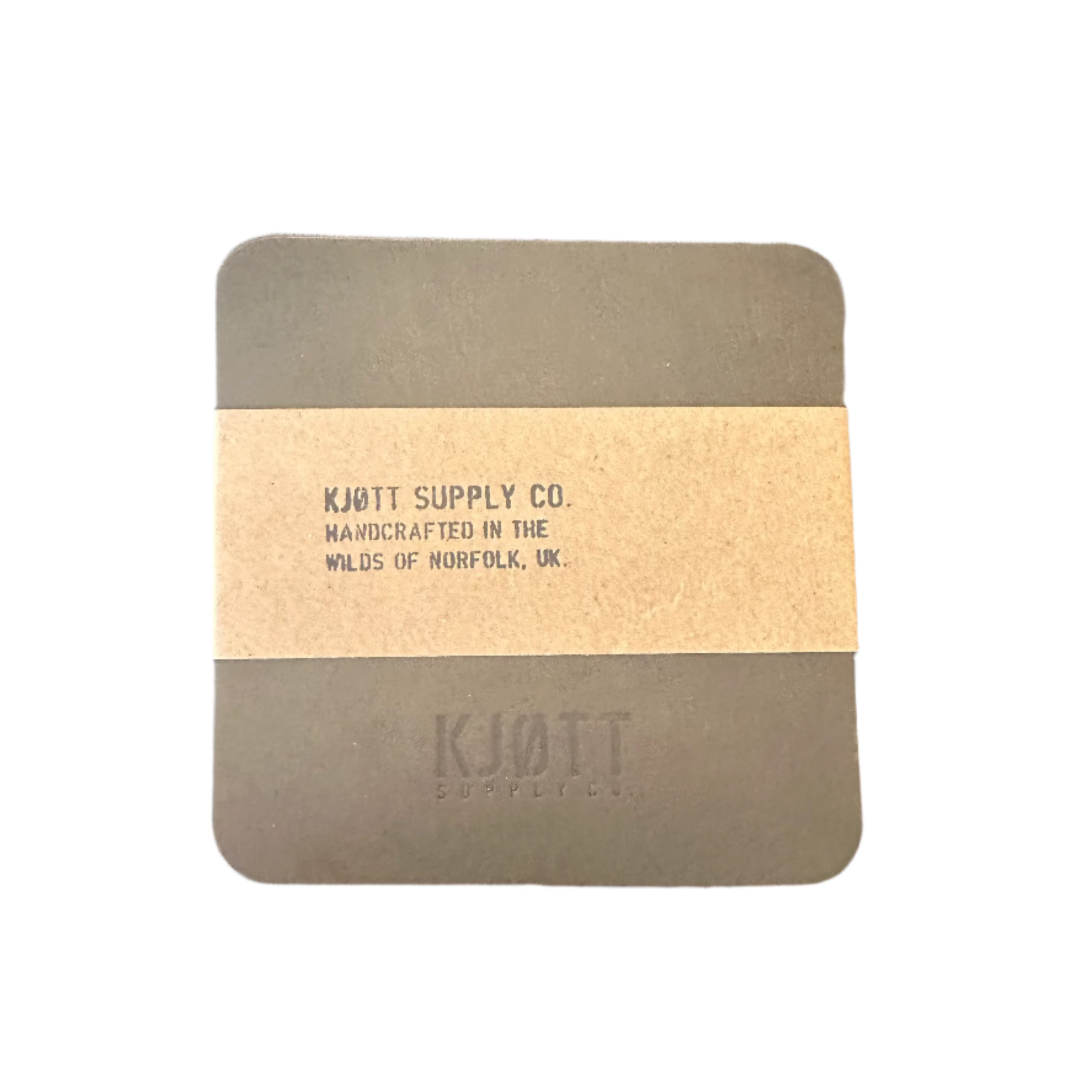Khaki green leather coaster by Kjøtt Supply Co., square with branded details and tan band, luxury drink accessory.