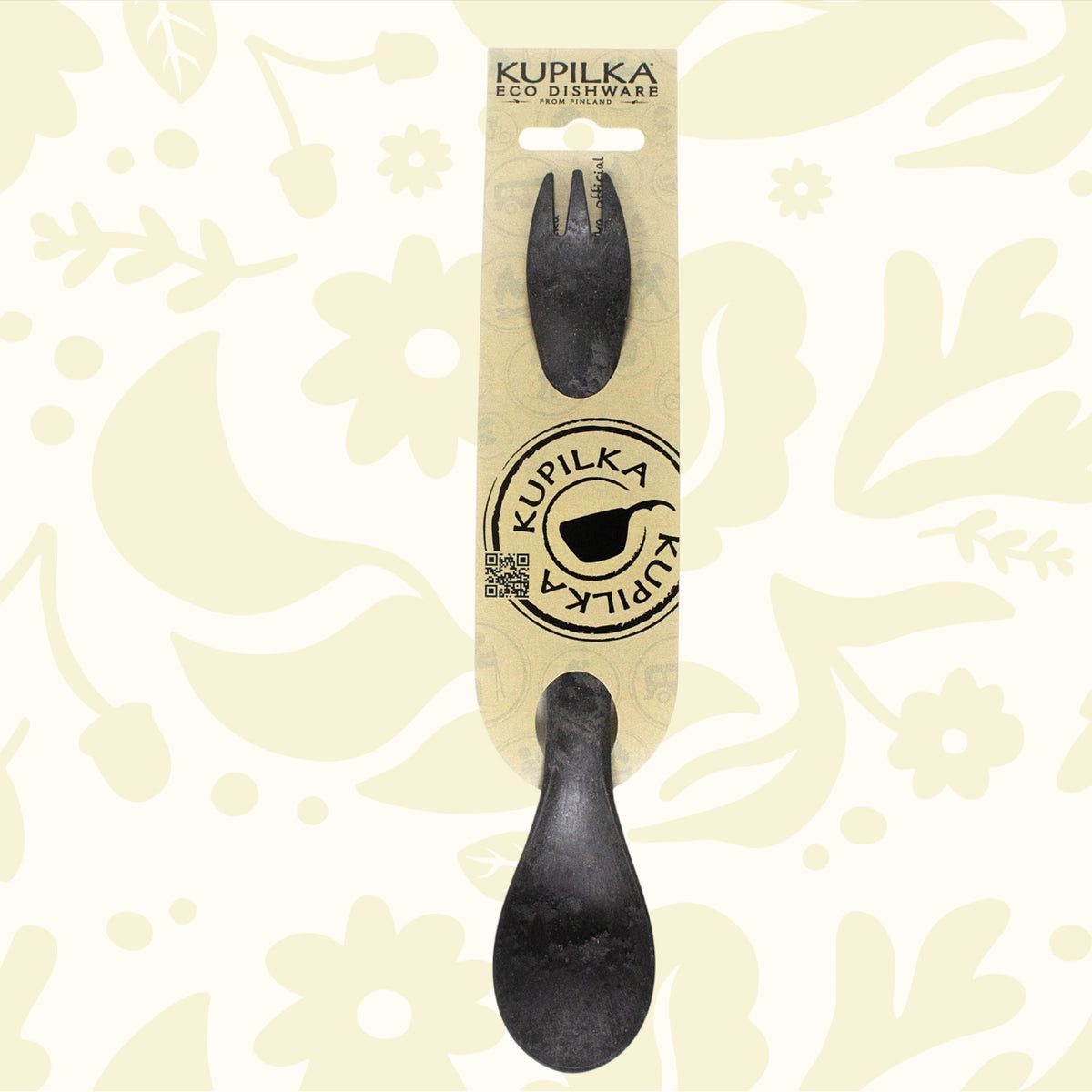 Kupilka Spork 225 Long black utensil on beige eco packaging, dual fork and spoon ends, sustainable outdoor camping gear.