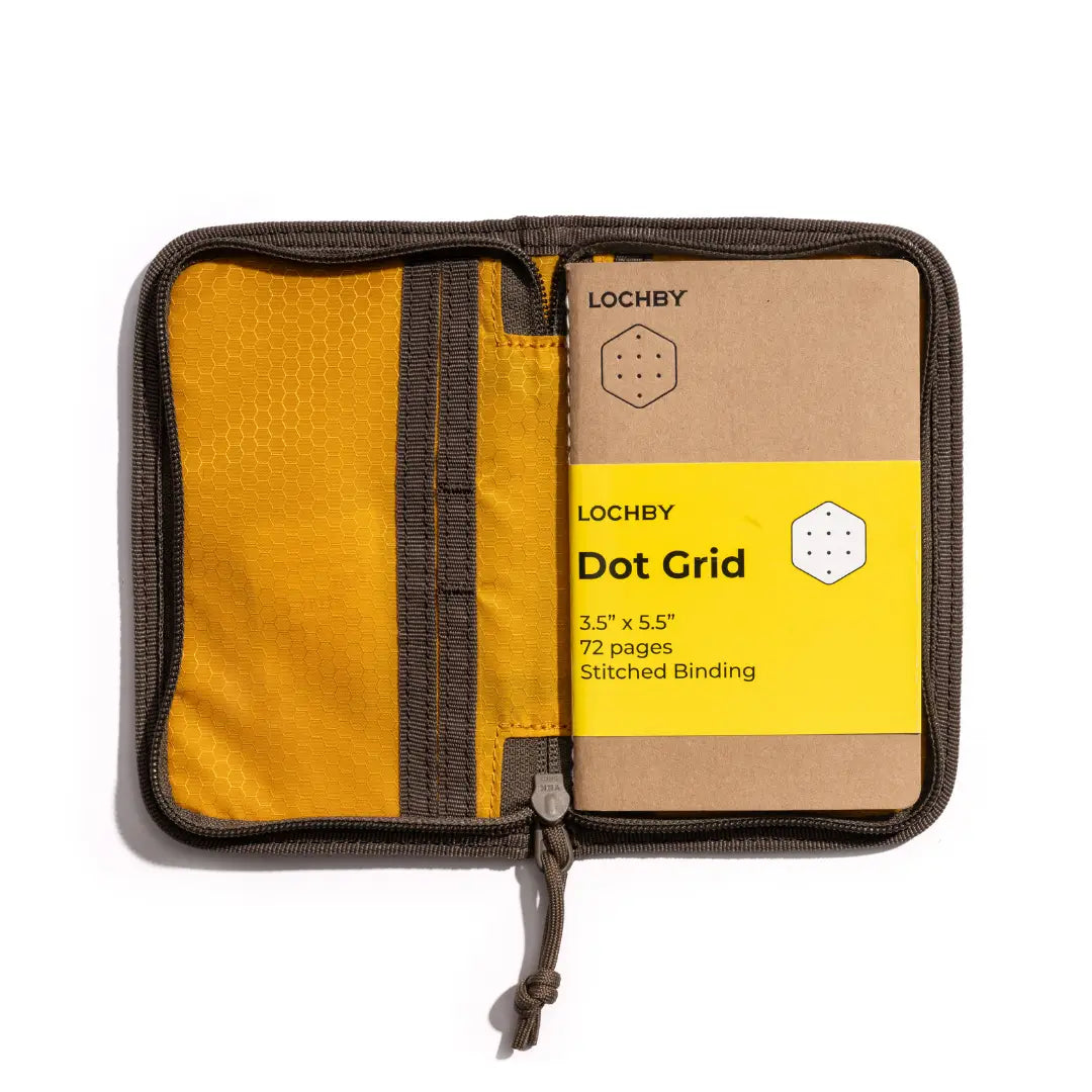 Forager Provisions LTD Lochby brown waxed canvas pocket journal open with interior yellow lining and dot grid notebook