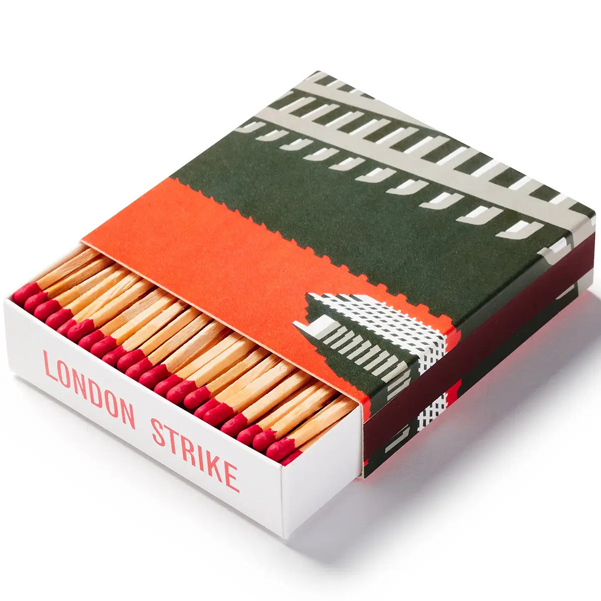 A box of matches called "Blue Crow Media Modernist Matchbox Barbican Estate," featuring an illustration by Paul Catherall, showcases modernist matchboxes inspired by 20th-century architecture. The cover displays a striking building, with some matches partially pulled out.
