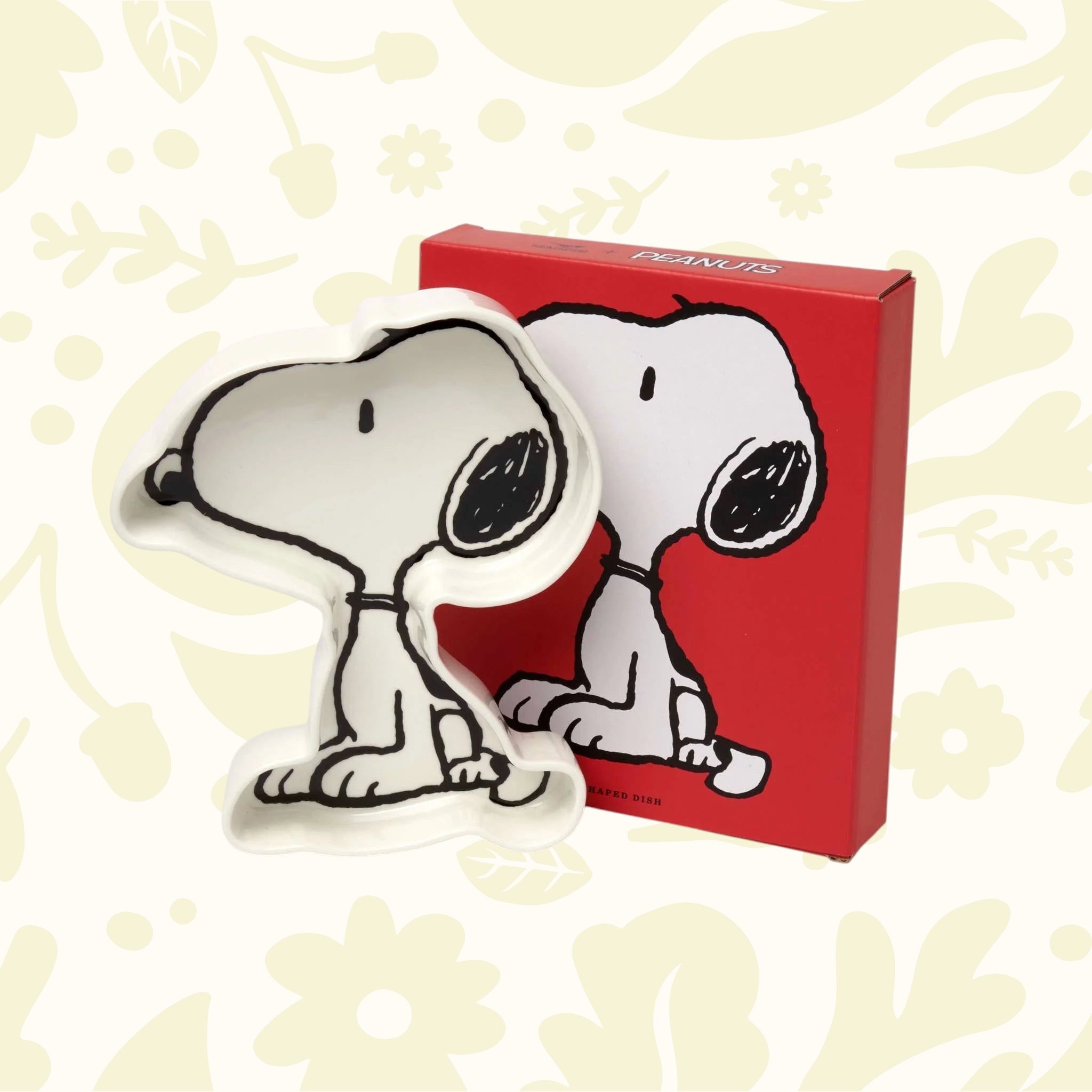 Forager Provisions LTD Snoopy shaped sitting vegan dish tray in white with black outlines next to its red gift box
