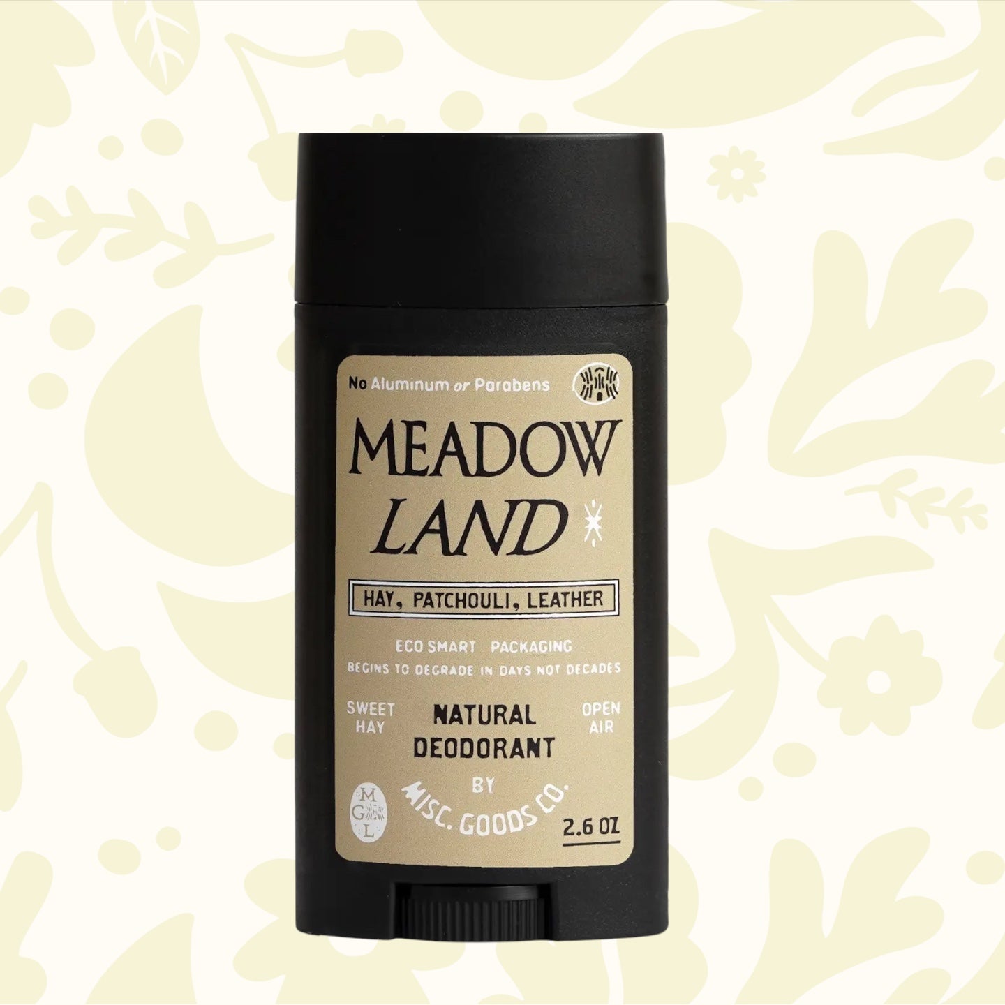 A black stick of deodorant labeled "Misc Goods Co Meadowland Natural Deodorant," featuring scents of hay, patchouli, and leather. It is aluminum-free and paraben-free, cruelty-free, and comes in Eco Smart Packaging.