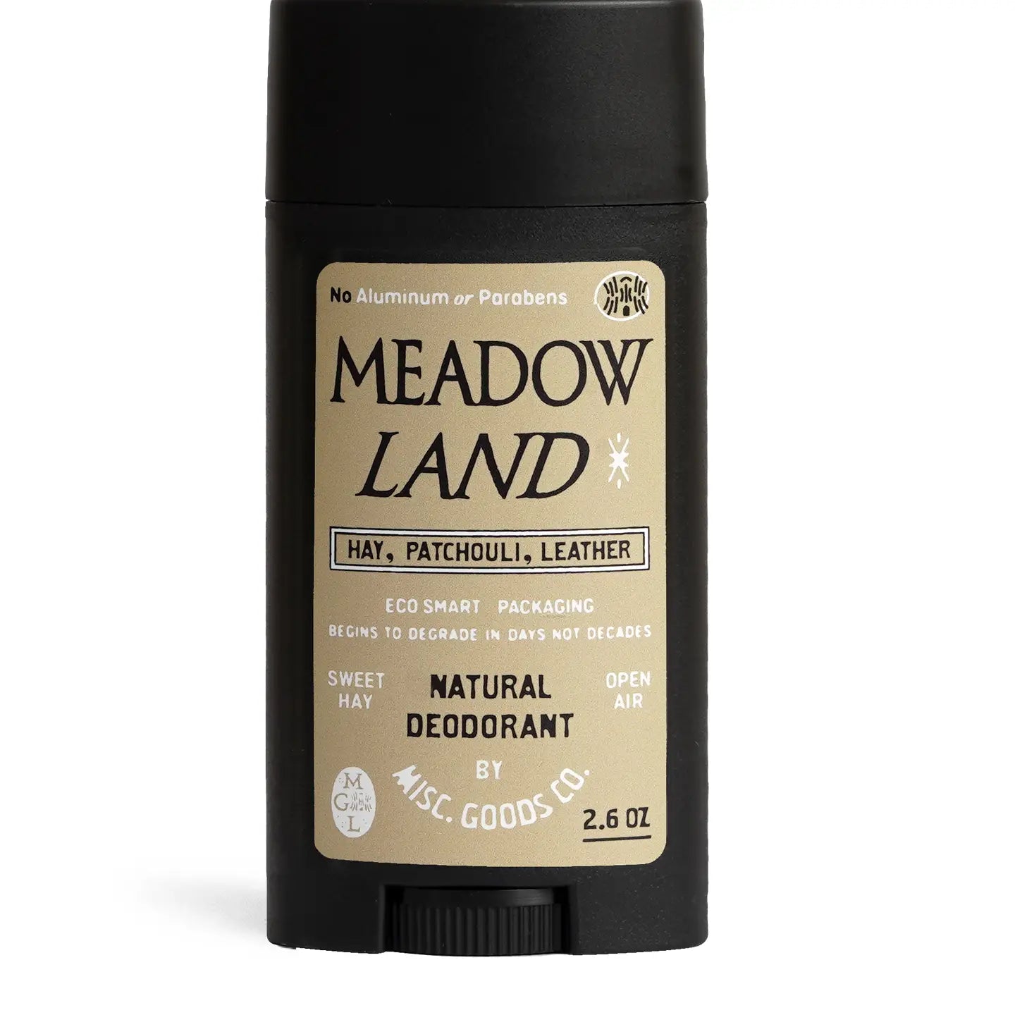 A black stick of deodorant labeled "Misc Goods Co Meadowland Natural Deodorant," featuring scents of hay, patchouli, and leather. It is aluminum-free and paraben-free, cruelty-free, and comes in Eco Smart Packaging.