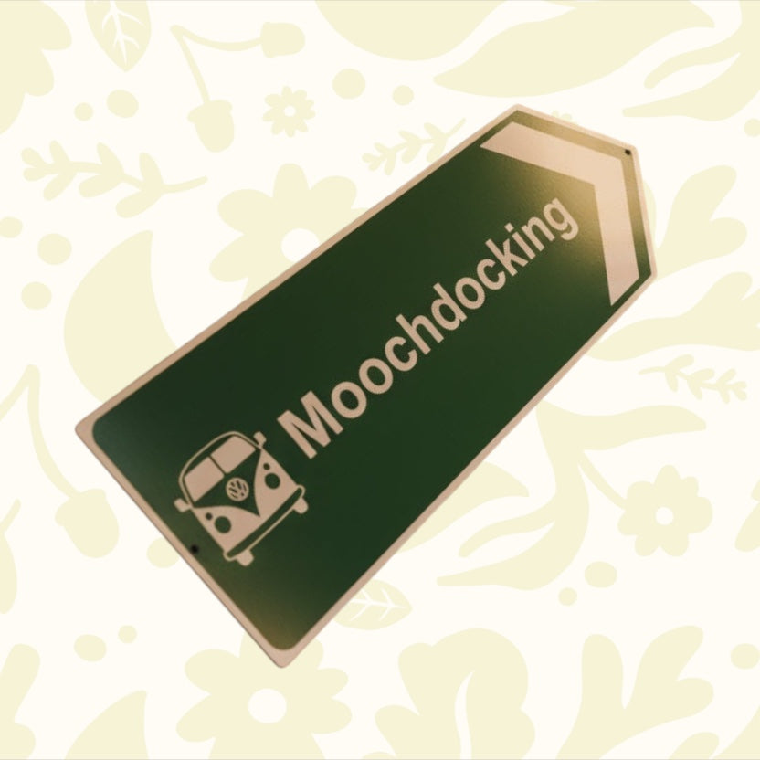 Forager Provisions green Moochdocking aluminum sign with van, arrow, floral details for RV camping (45×15cm).
