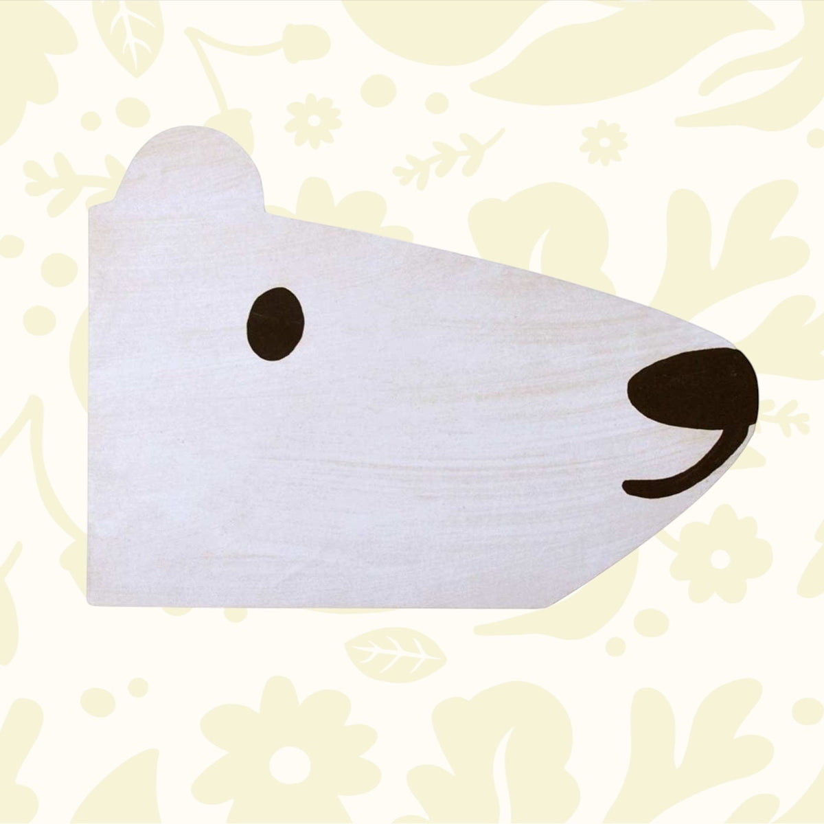 A face of a polar bear with simple black eye and round nose.