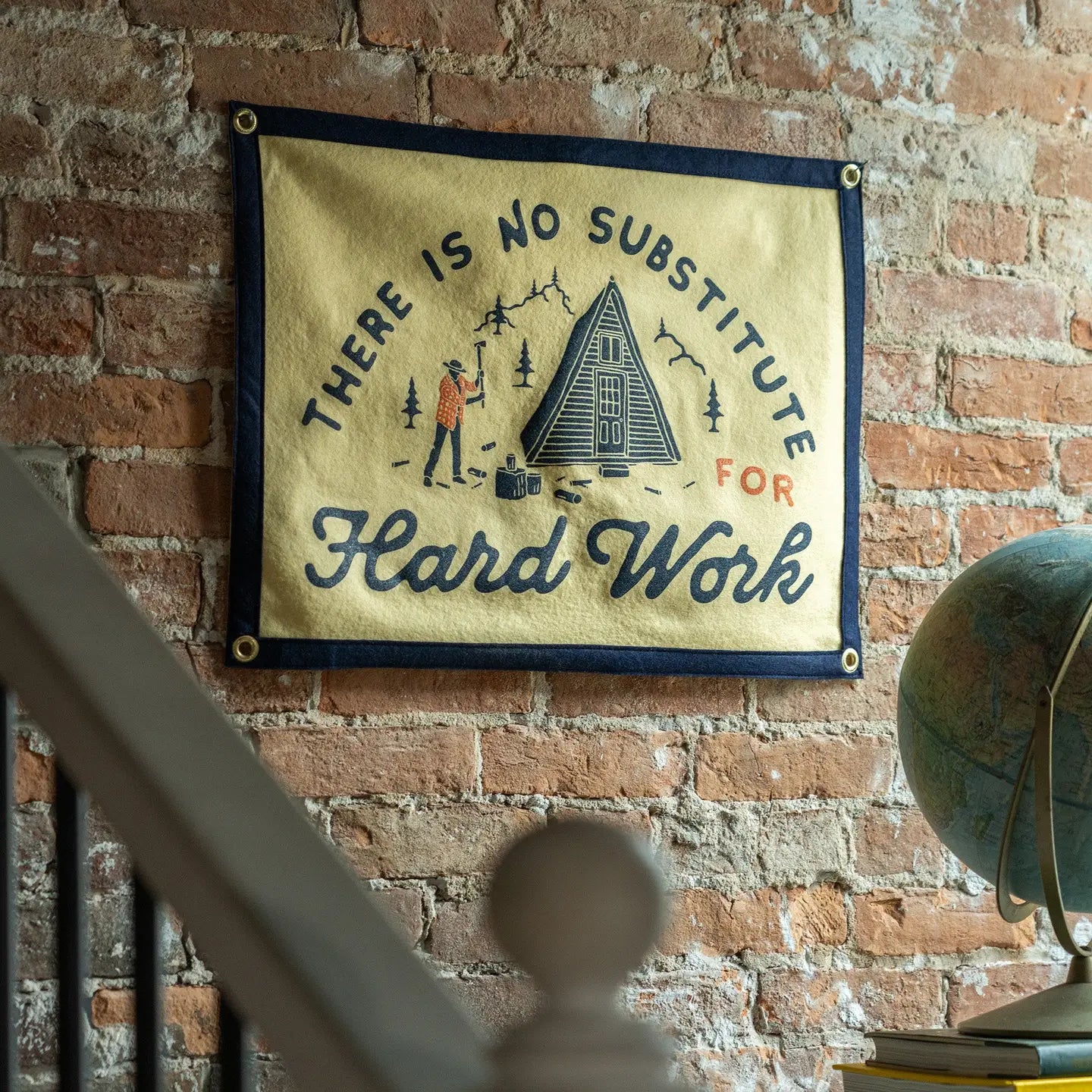 Oxford Pennant "There Is No Substitute For Hard Work" camp flag shows rustic cabin, trees graphic; ideal motivational decor.