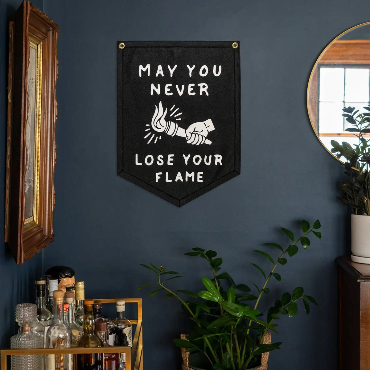Forager Provisions LTD Oxford Pennant black felt camp flag with white May You Never Lose Your Flame text and torch art