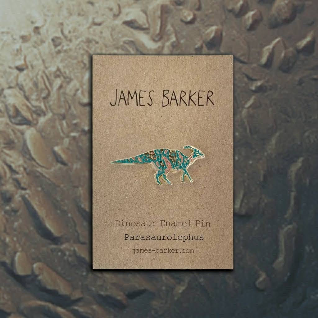 Forager Provisions LTD James Barker Parasaurolophus dinosaur hard enamel pin badge on a branded display card.