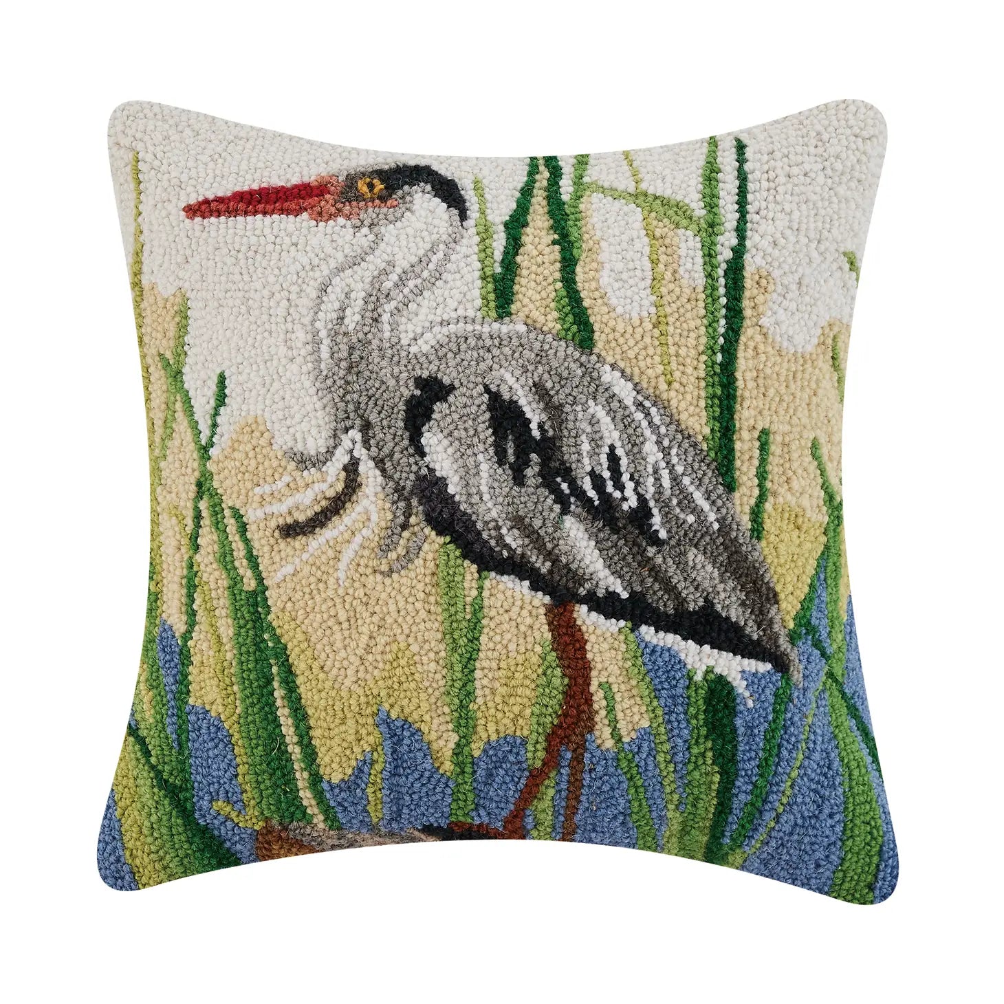 The Peking Handicraft Heron Hook Cushion is a square 16x16" throw pillow featuring a needlepoint design of a heron standing amid green reeds, blue water, and a beige sky background. This accent pillow is made from 100% wool and takes inspiration from the serene story of The Boy & The Heron.