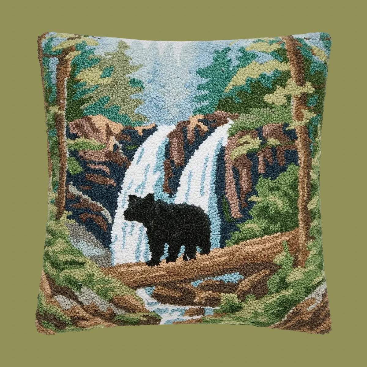 Forager Provisions LTD square wool hooked cushion featuring a black bear standing by a waterfall in a forest scene.