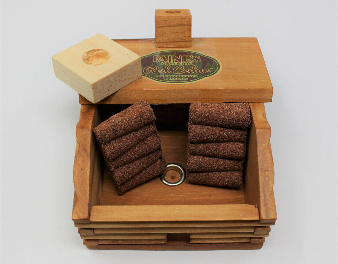 Wooden cabin with incense cones inside