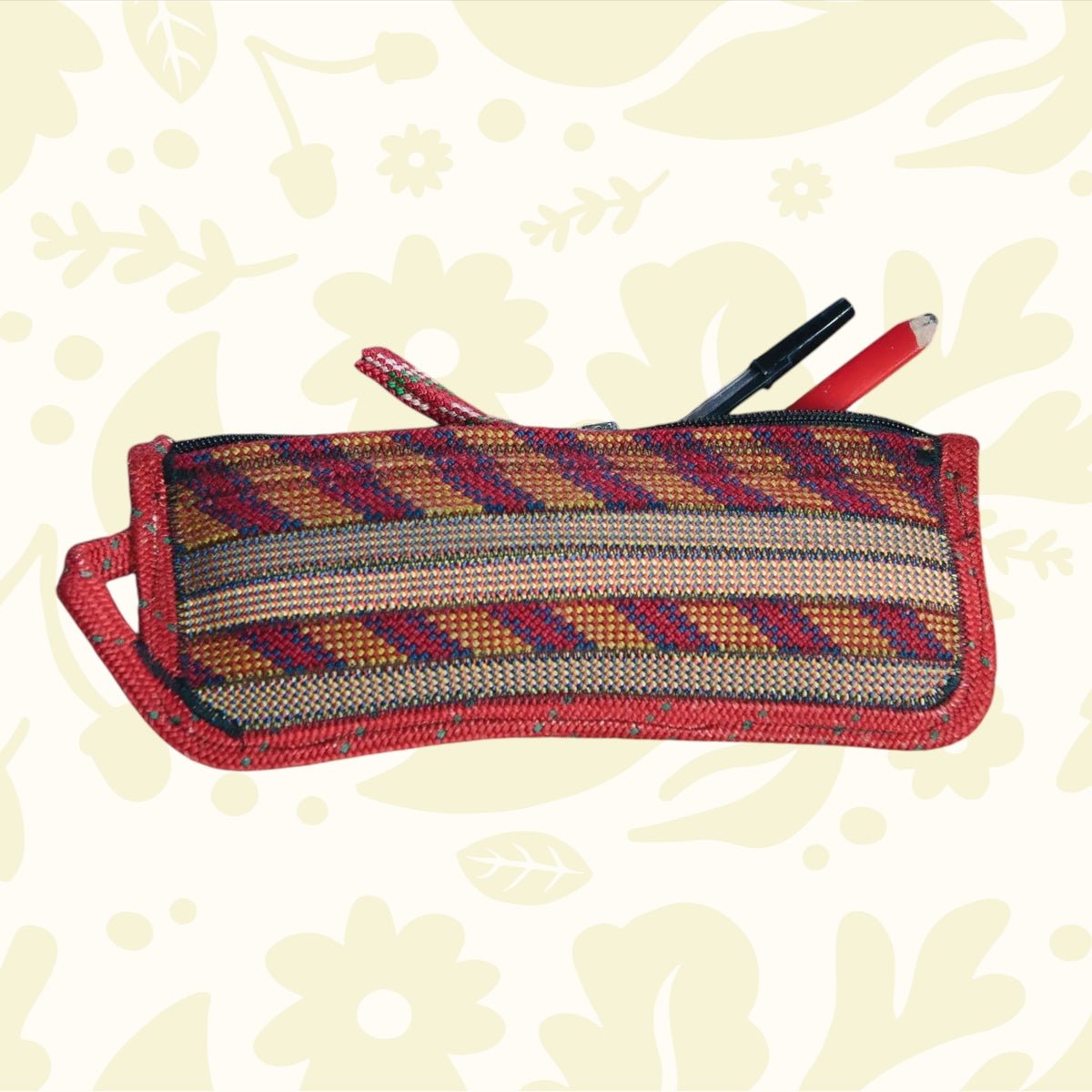 Forager Provisions LTD Scavenger large zip pouch in Fire colourway made from recycled climbing rope with pens inside.