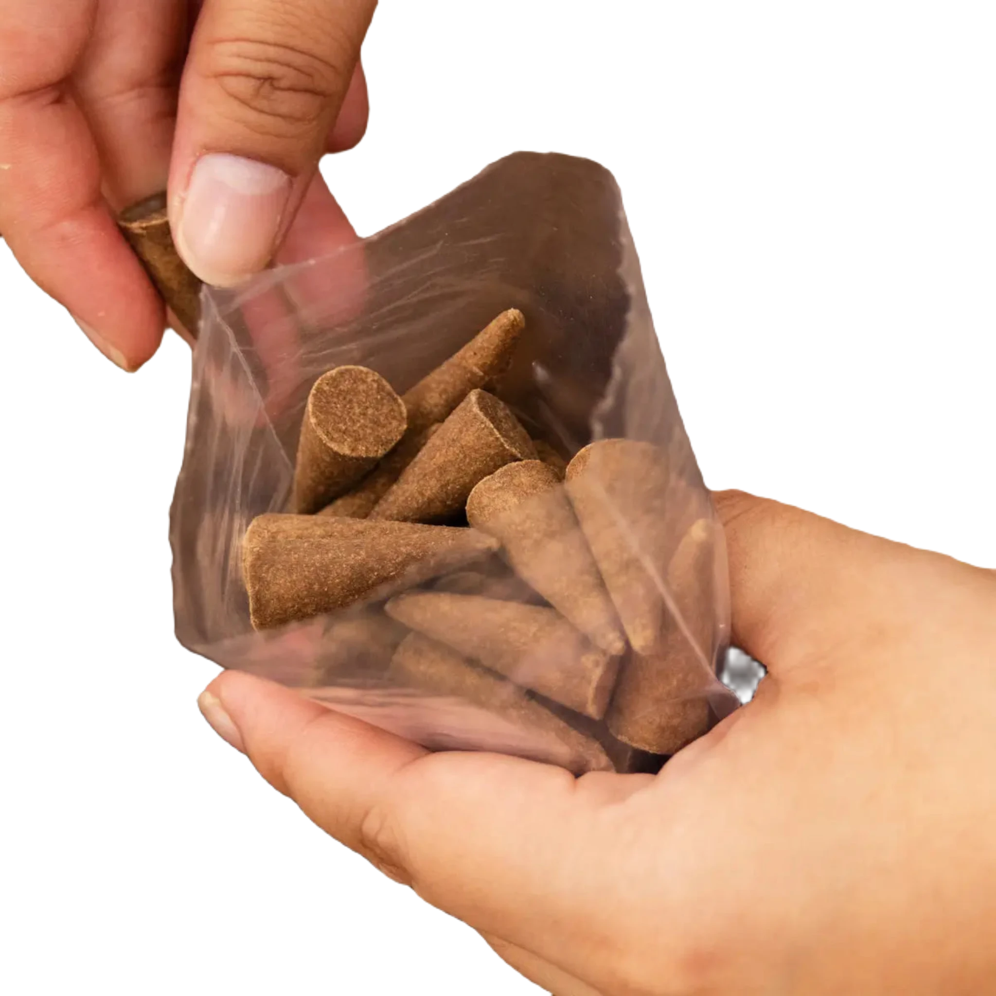 Hands carefully placing incense into a plastic bag from a larger container, with the subtle aroma of Upstate Stock Kaaterskill Wilds Incense Cones filling the air.