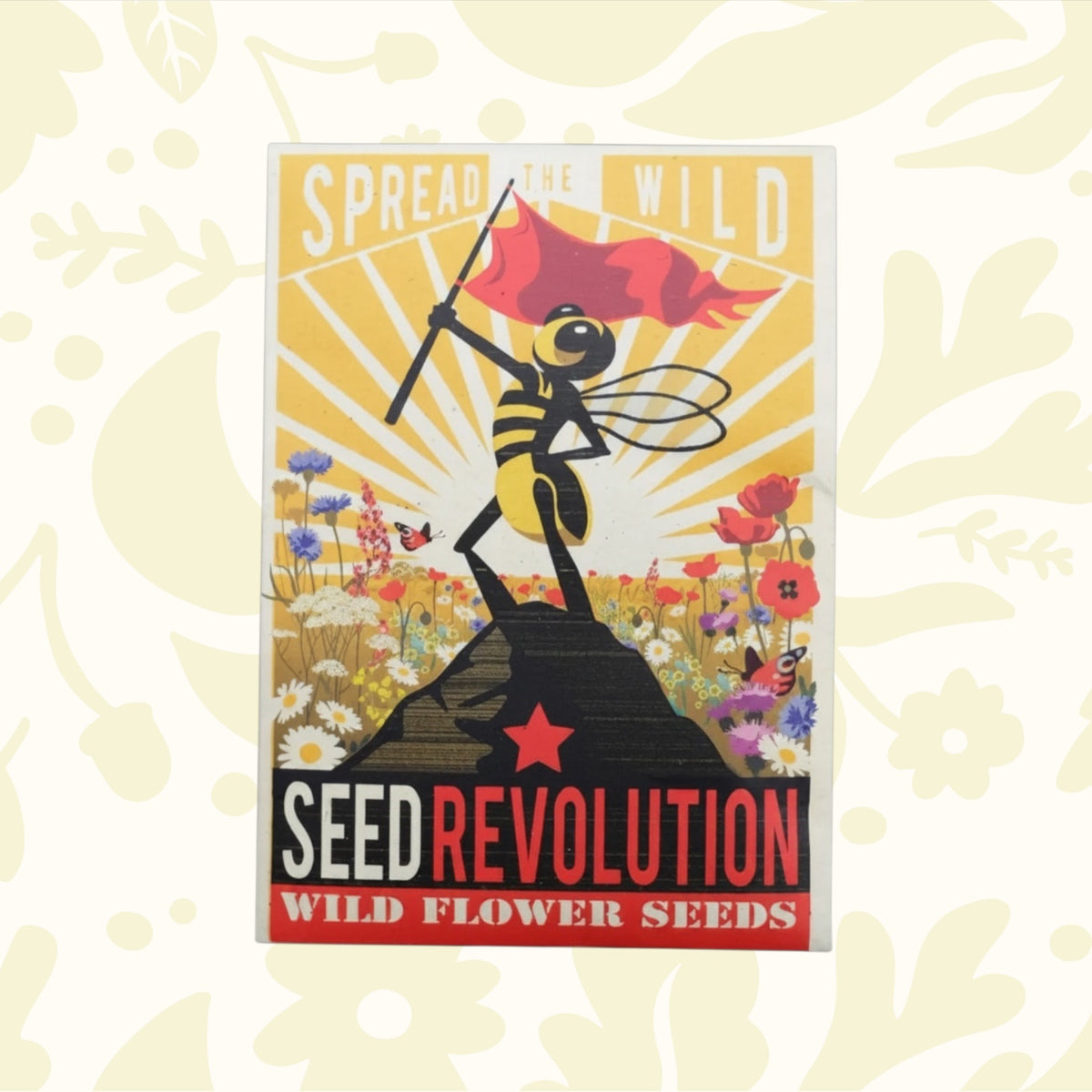 Forager Provisions LTD Seed Revolution wildflower seed packet with illustrated bee holding a flag in a meadow