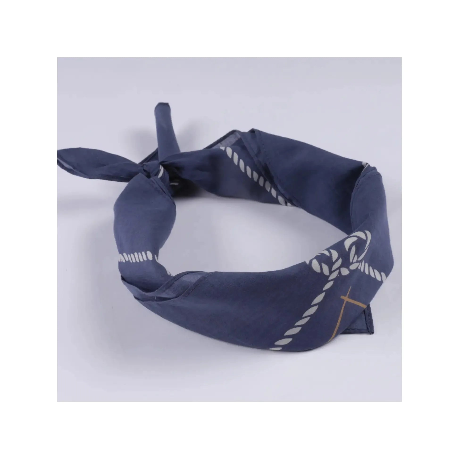 The Sendero Provisions Skeleton Riders Bandana is a navy blue accessory adorned with cowboy and Western-themed illustrations, featuring the text "Sendero Provisions" in the center. It is crafted from 100% Organic Japanese Cotton.