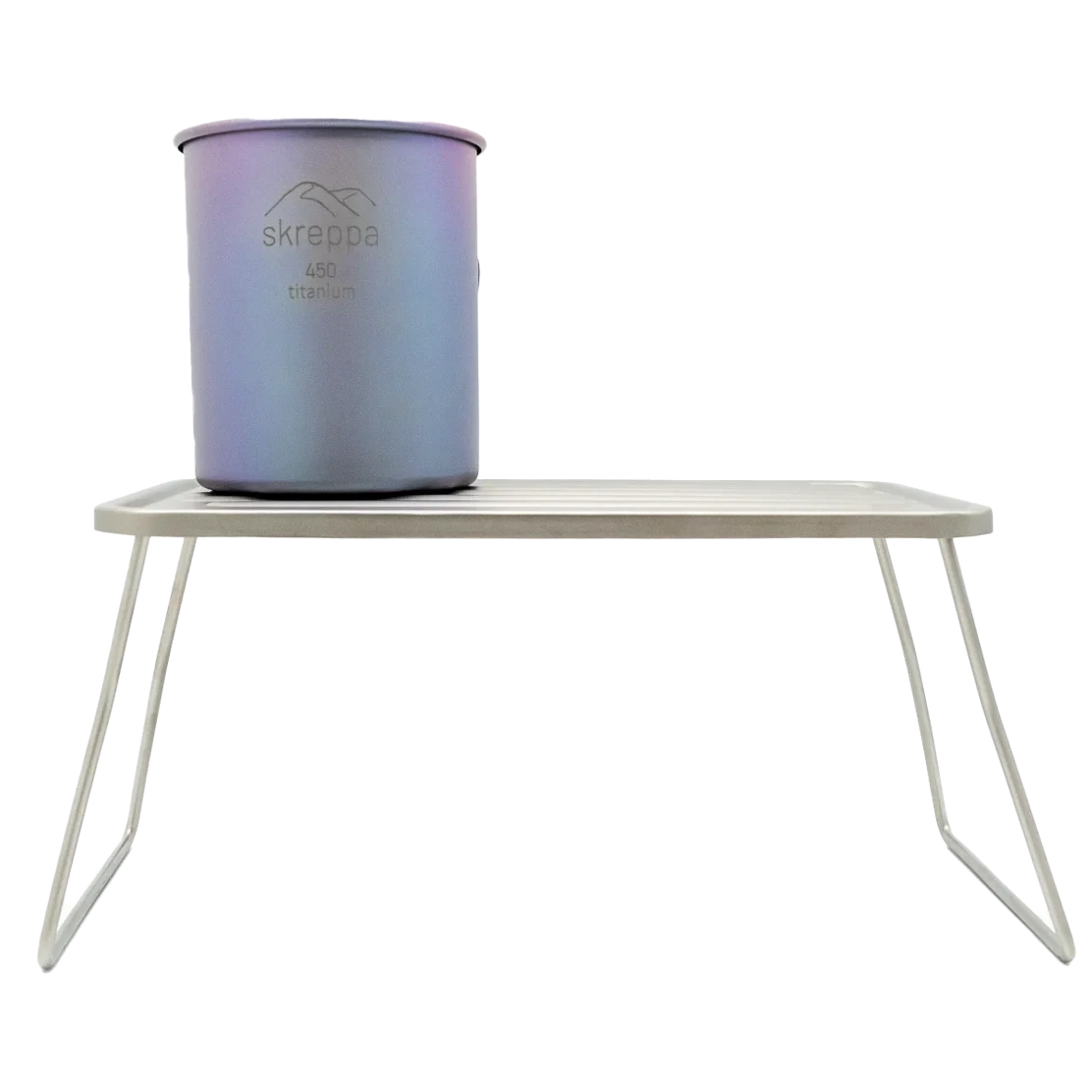 Skreppa 450 titanium pot on Skreppa Titanium Camping Table Small with angled legs—ultralight gear for backpacking cooks.