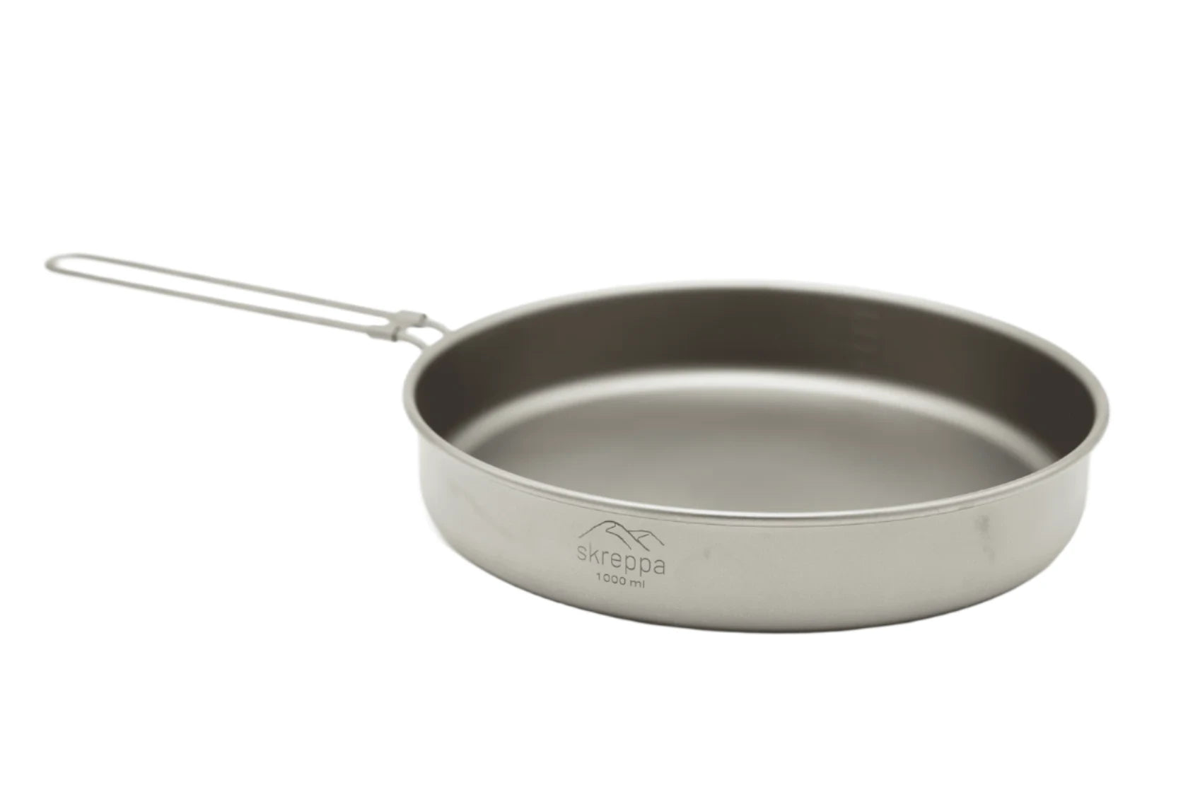 Skreppa Titanium Frying Pan with foldable handle for ultralight camping and backpacking, lightweight cookware on white background.