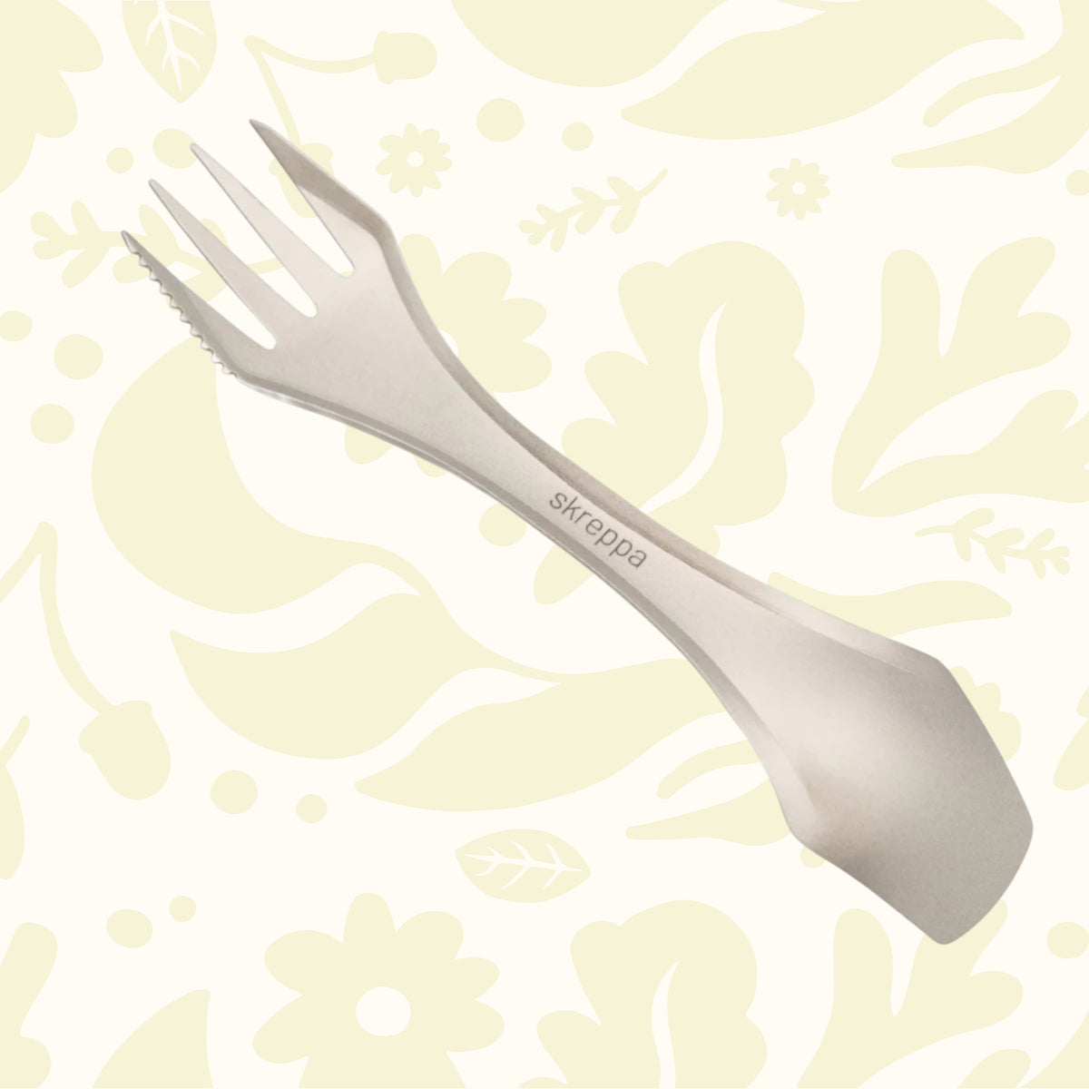 Skreppa TrekTensil 3-in-1 titanium camping cutlery—fork, knife, spoon—lightweight backpacking essential utensil.