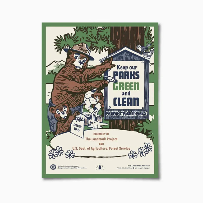 The Landmark Project Smokey Bear poster: Smokey Bear and cubs post "Keep Our Parks Green" sign in classic park art style.
