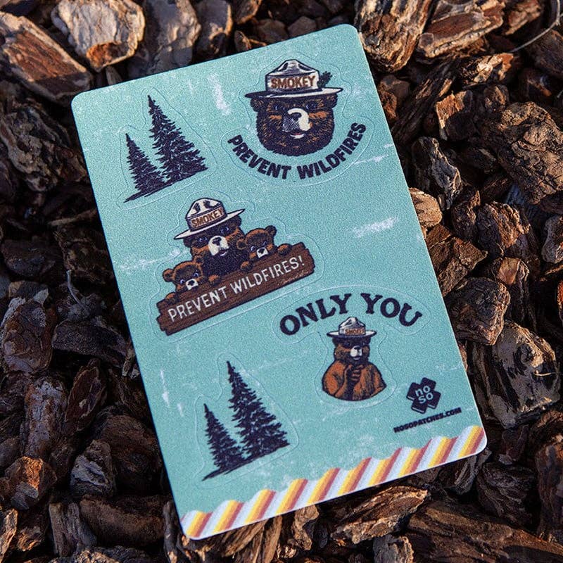 Forager Provisions LTD Smokey Bear Dazzits repair patch sheet featuring iconic conservation artwork on bark mulch.