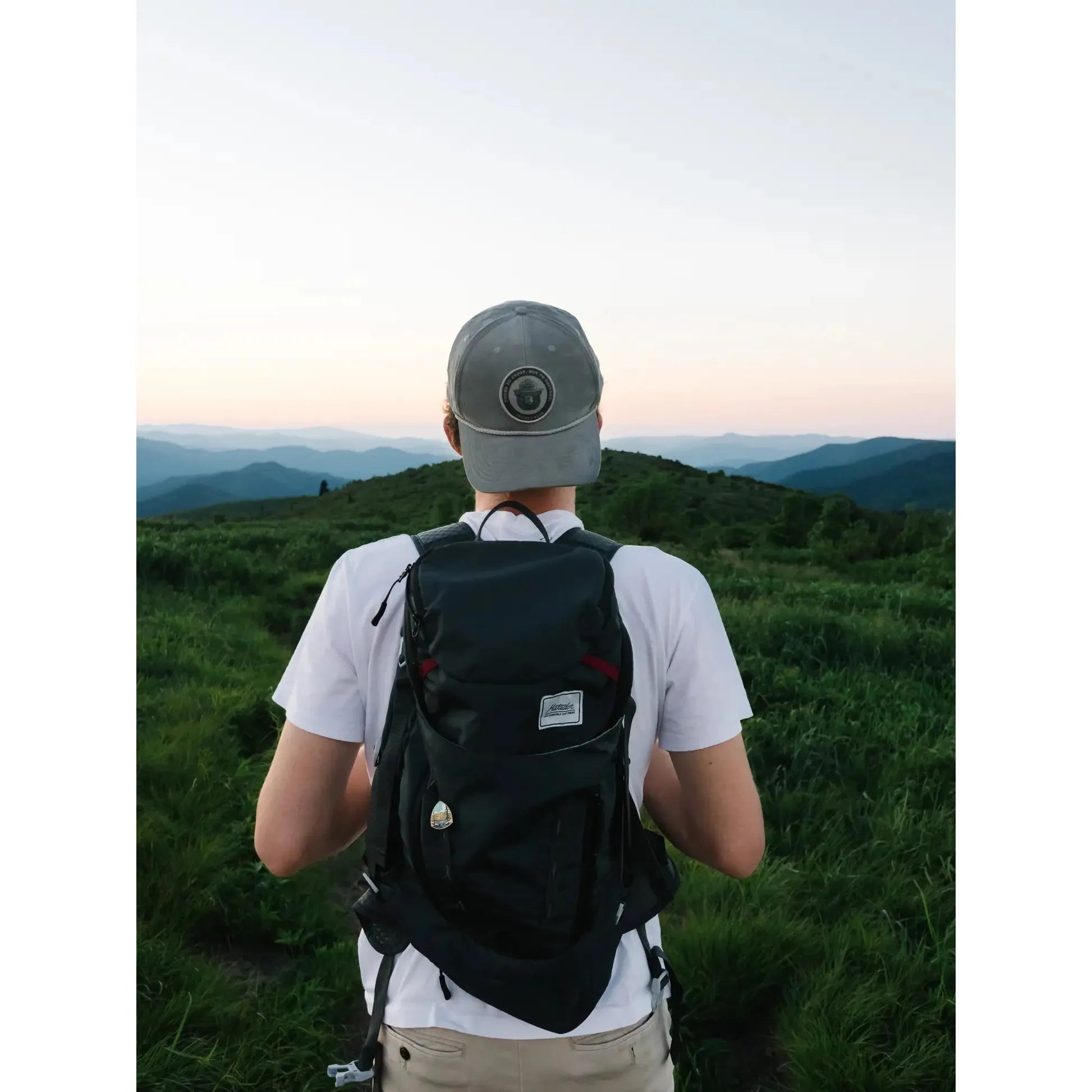 The Landmark Project Yours To Enjoy Smokey Bear Cap is a light gray baseball cap with an embroidered circular patch featuring a hat-wearing bear and the text 'Smokey Bear 'Only You.' Celebrating wildfire prevention, this cap is a must-have among Smokey Bear products endorsed by the US Forest Service.