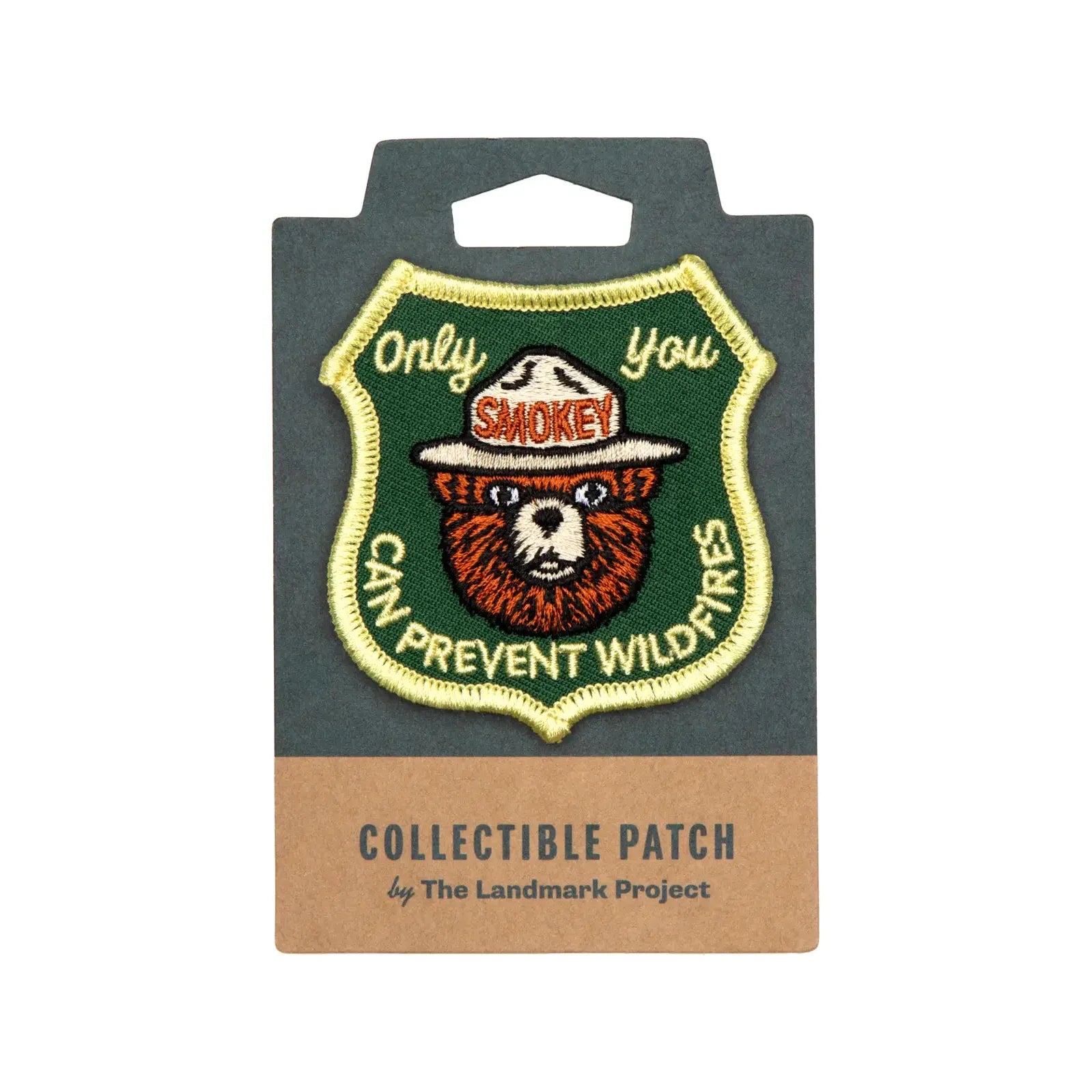 The Landmark Project Smokey Bear Patch - Only You Forestry is a collectible patch highlighting wildfire prevention, featuring Smokey Bear and the text "Only you can prevent wildfires" on a forest green shield-shaped background.