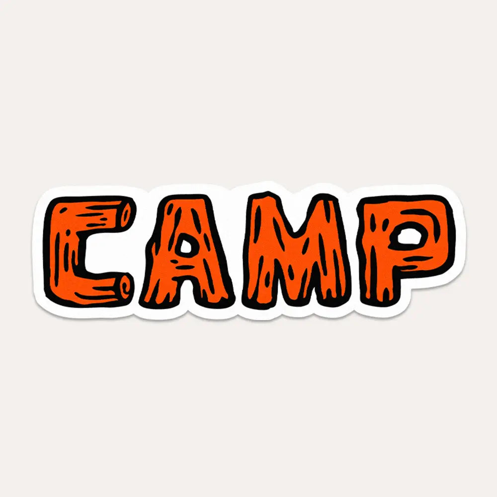 Bold orange wood-style CAMP letters on a Union Made waterproof vinyl sticker, perfect for outdoor adventure and camping gear.